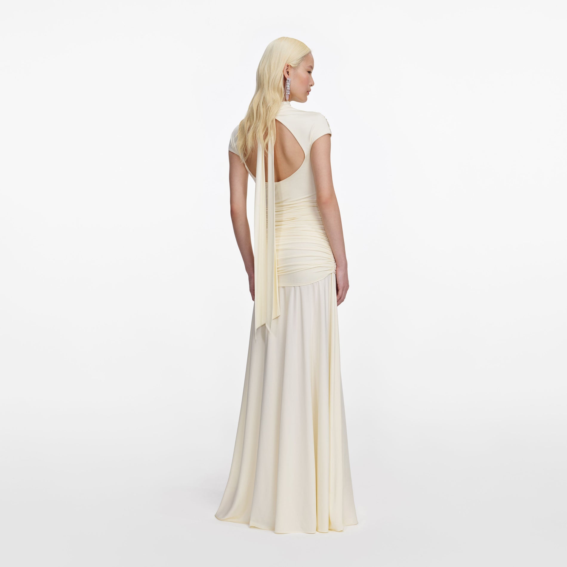 Back view of a woman wearing the Yellow Jersey Draped Maxi Dress