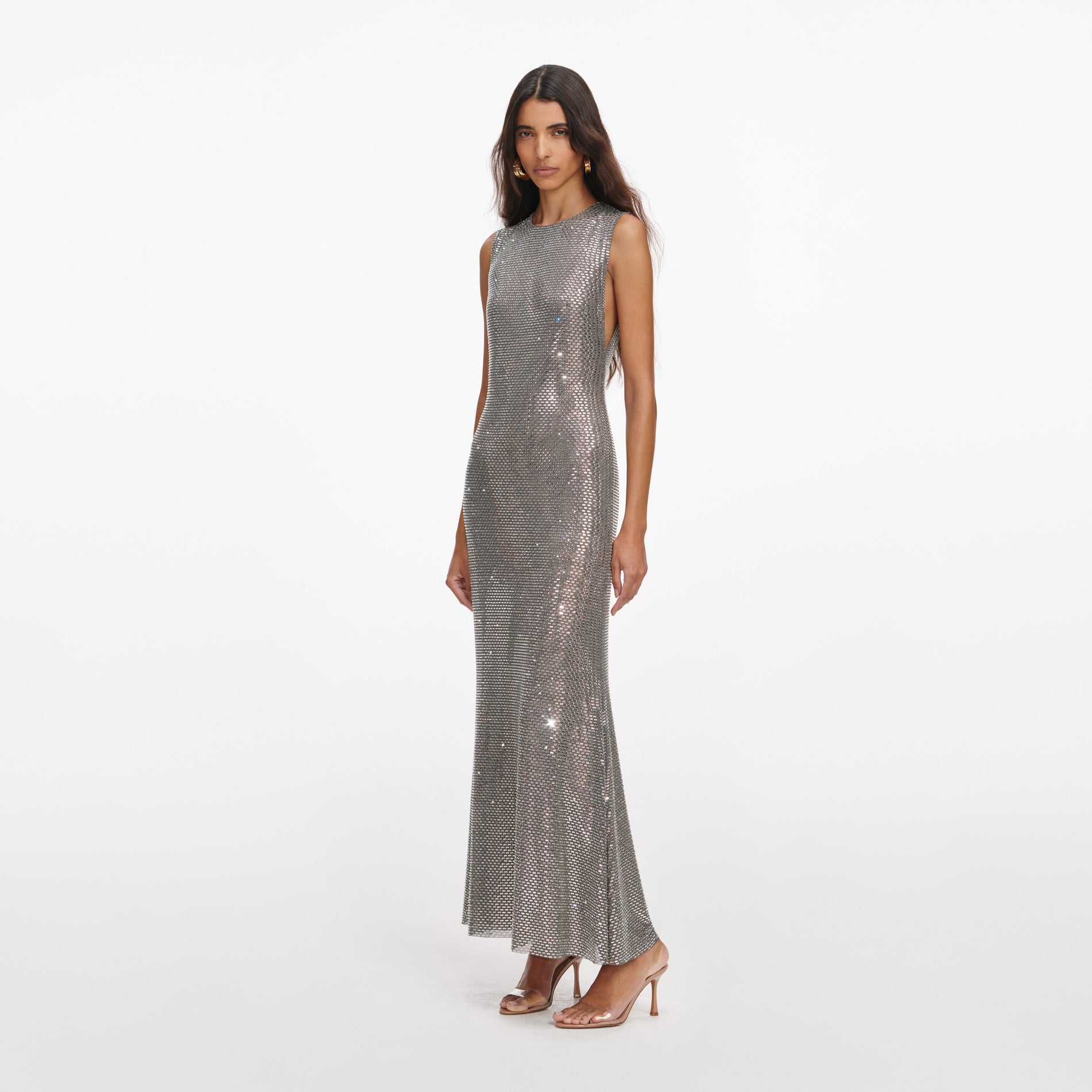 Side view of a woman wearing the Grey Rhinestone Mesh Midi Dress