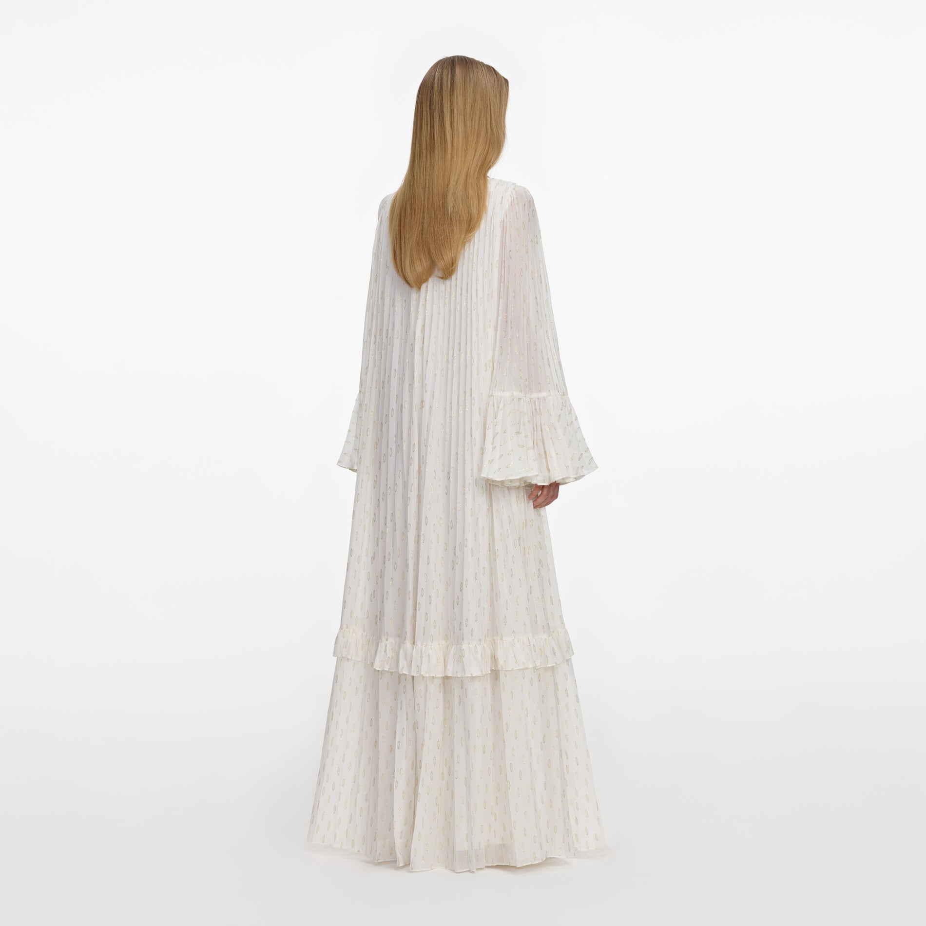 Back view of a woman wearing the Cream And Gold Chiffon Maxi Dress