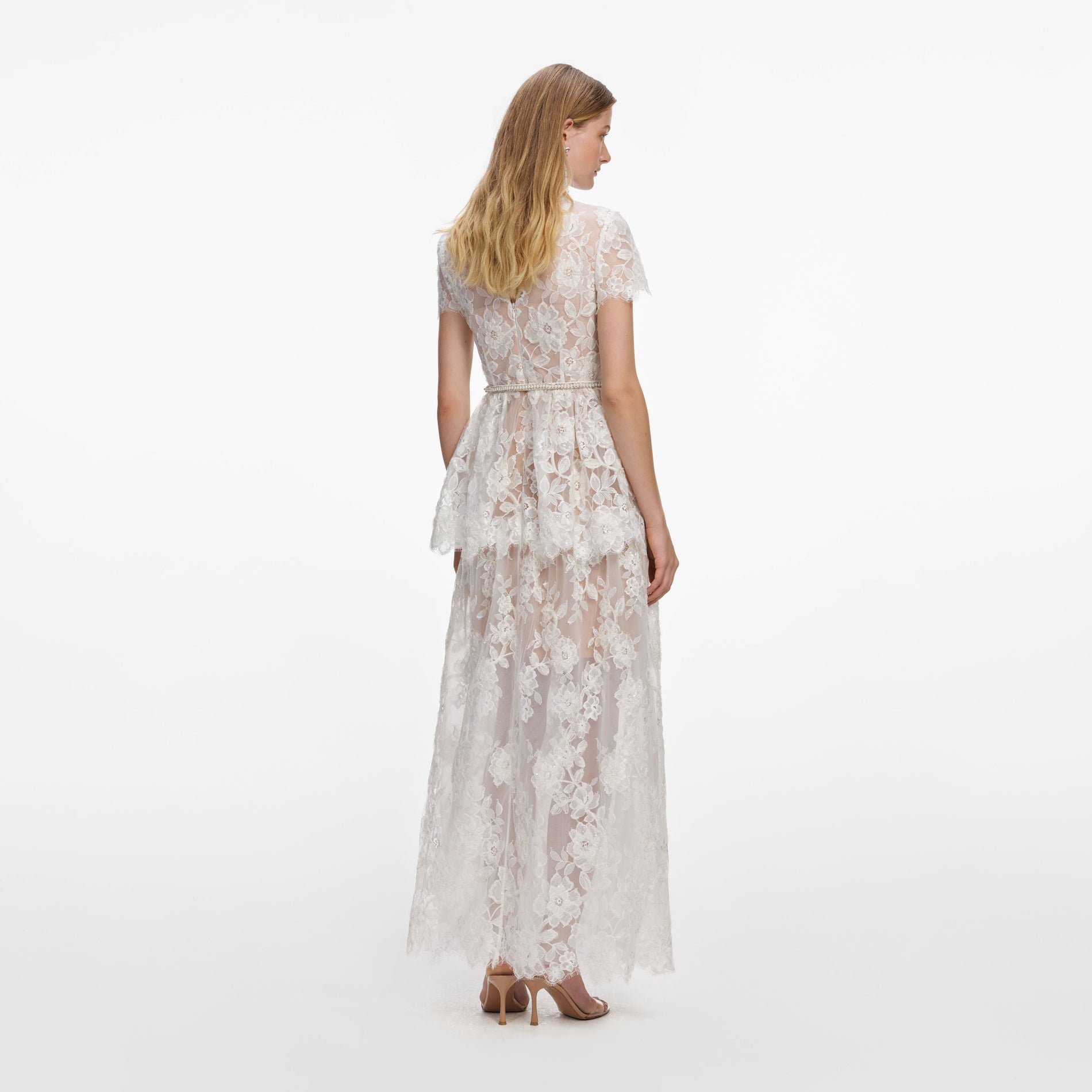 Back view of a woman wearing the White Sequin Lace Tiered Maxi Dress