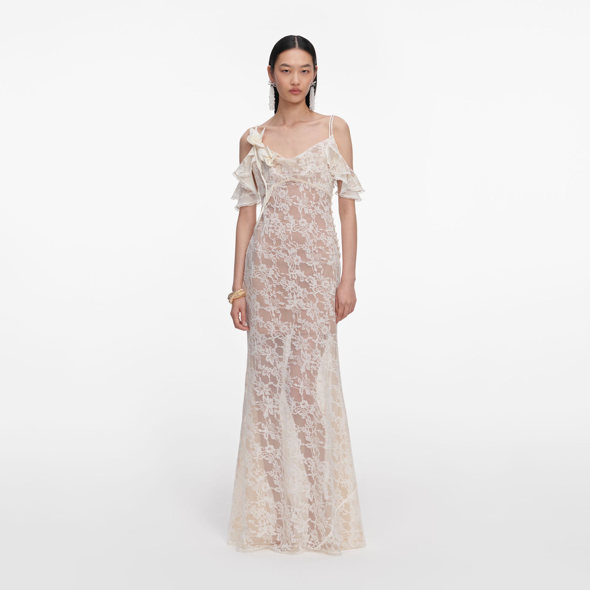 Front view of a woman wearing the Cream Lace Flower Maxi Dress
