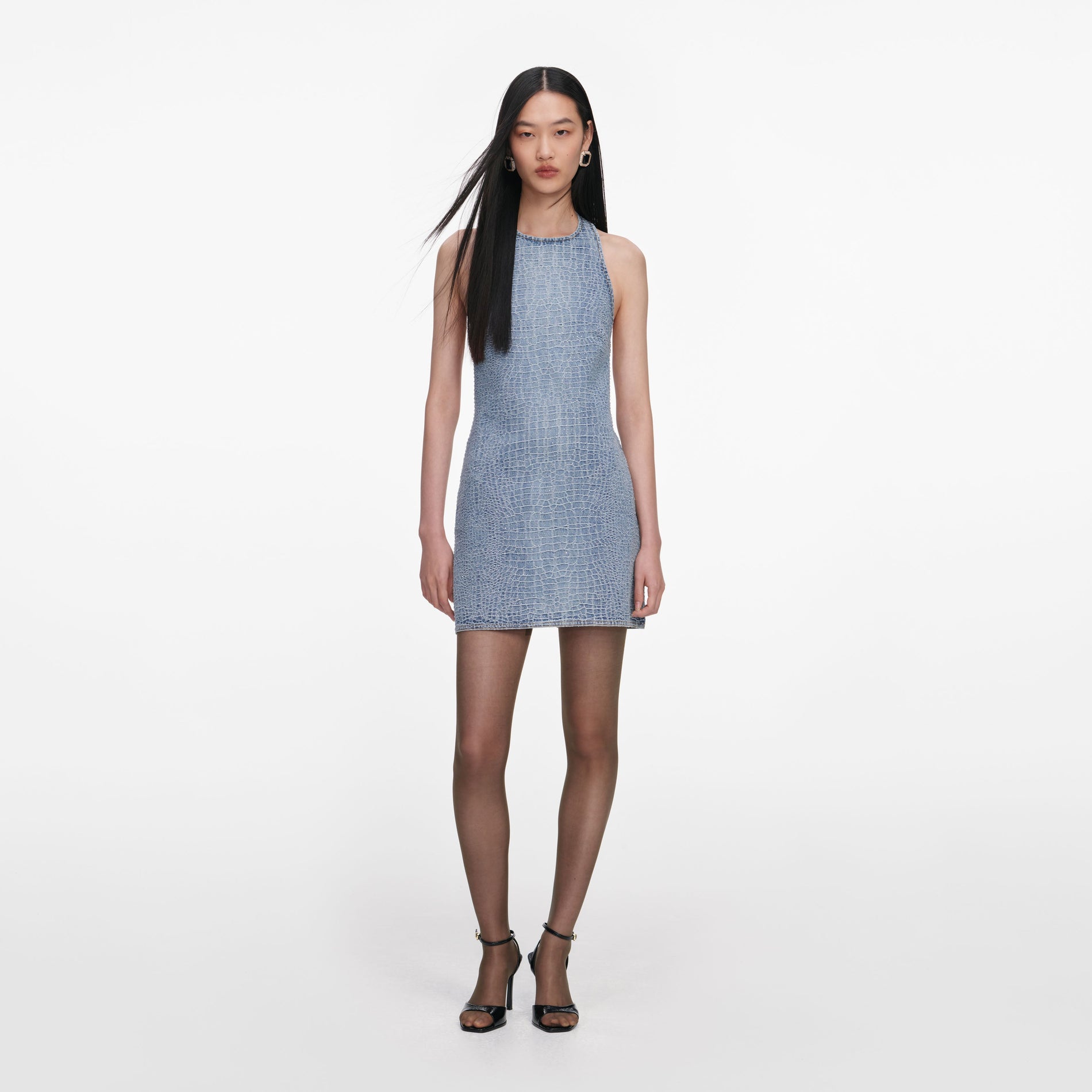 Front view of a woman wearing the Rhinestone Croc Effect Denim Mini Dress