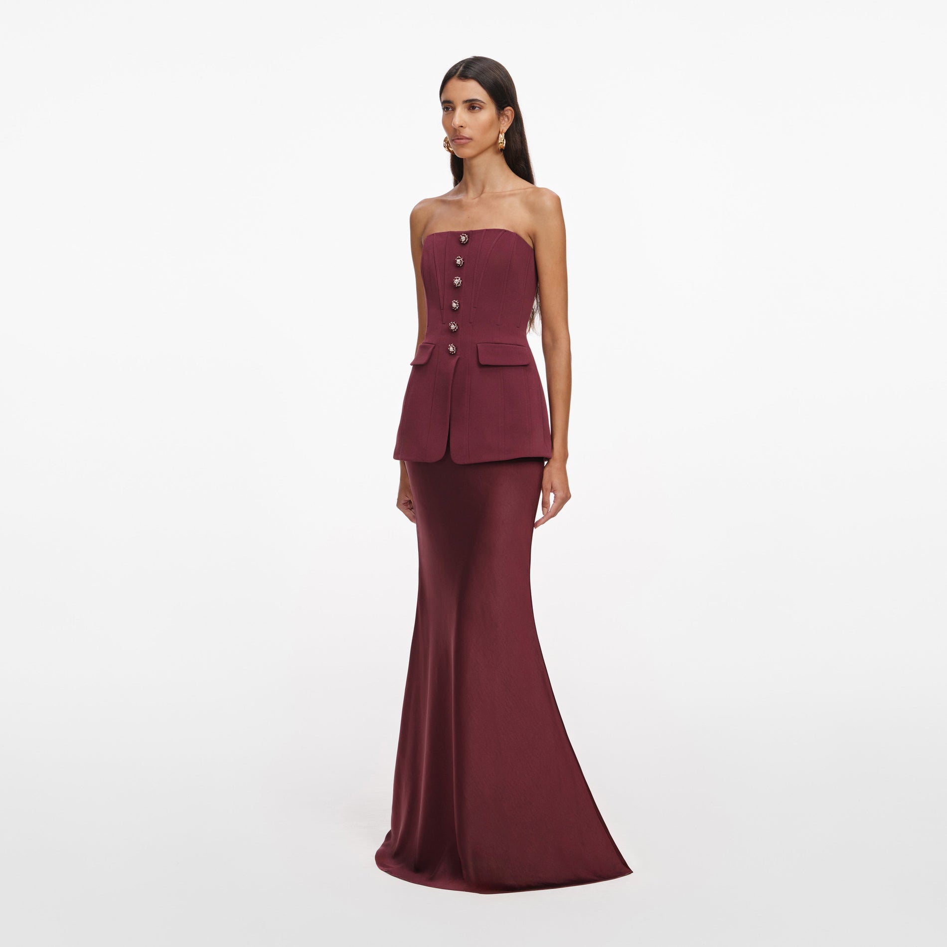 Side view of a woman wearing the Burgundy Bandeau Maxi Dress