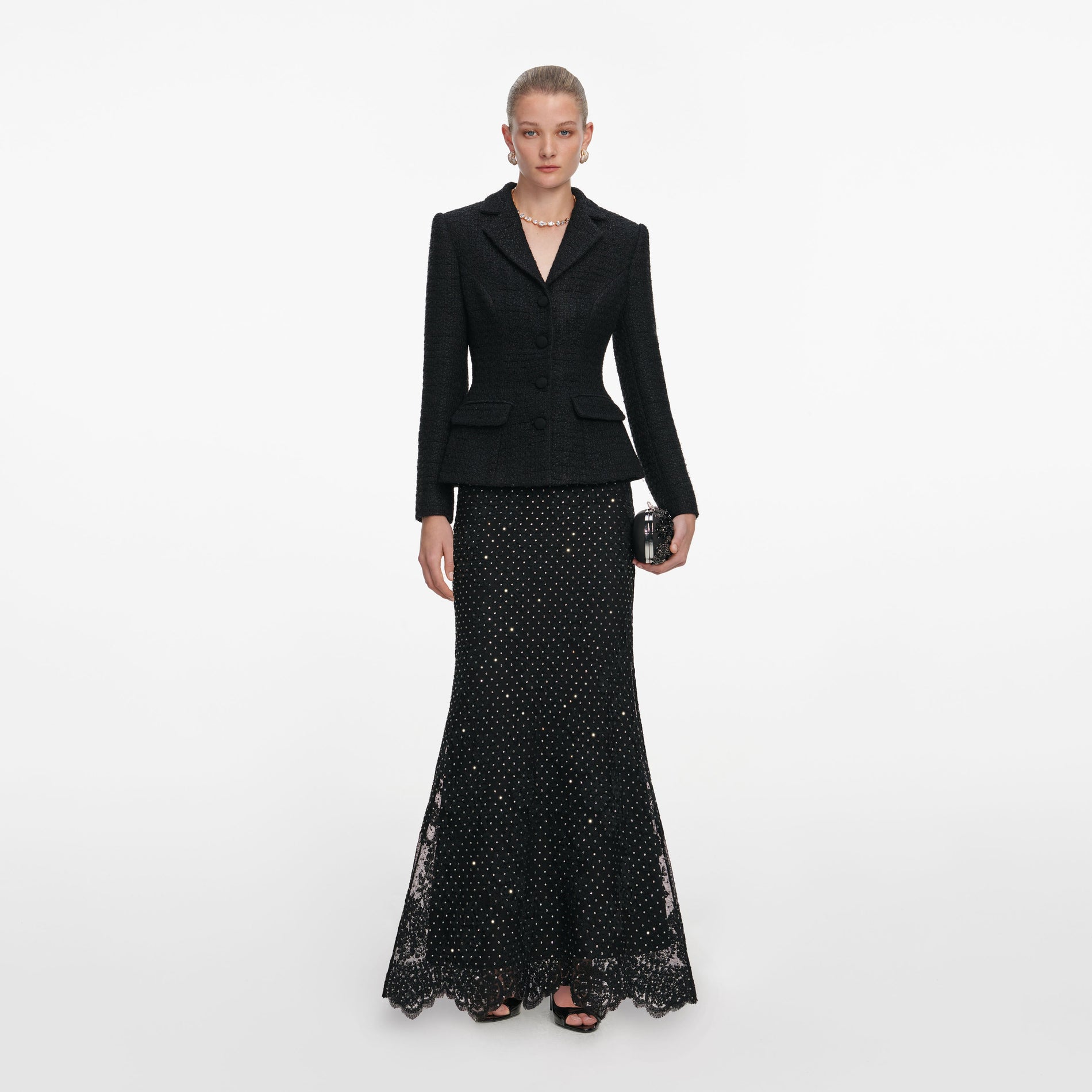 Front view of a woman wearing the Black Boucle Rhinestone Lace Maxi Dress