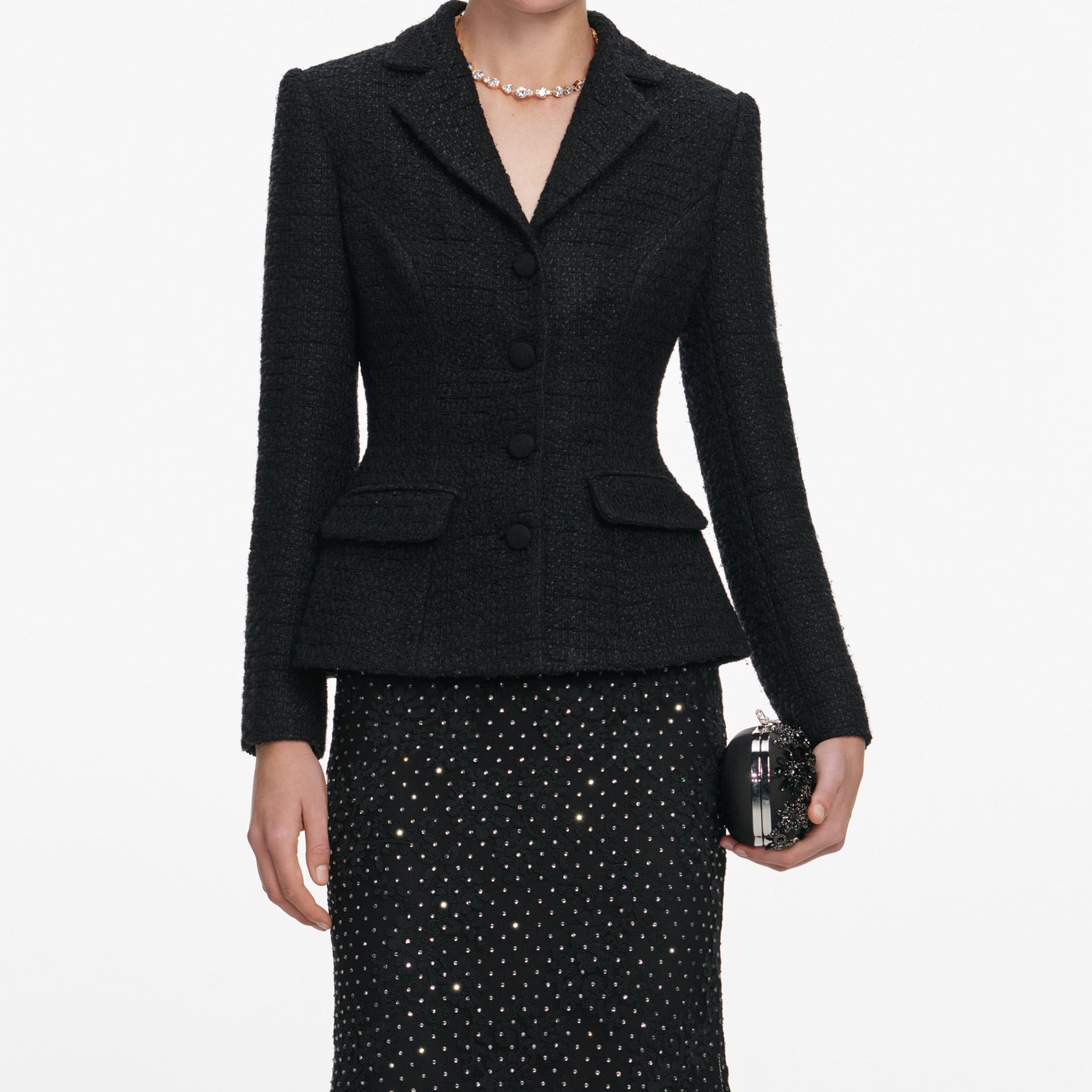 A close up of a woman wearing the Black Boucle Rhinestone Lace Maxi Dress