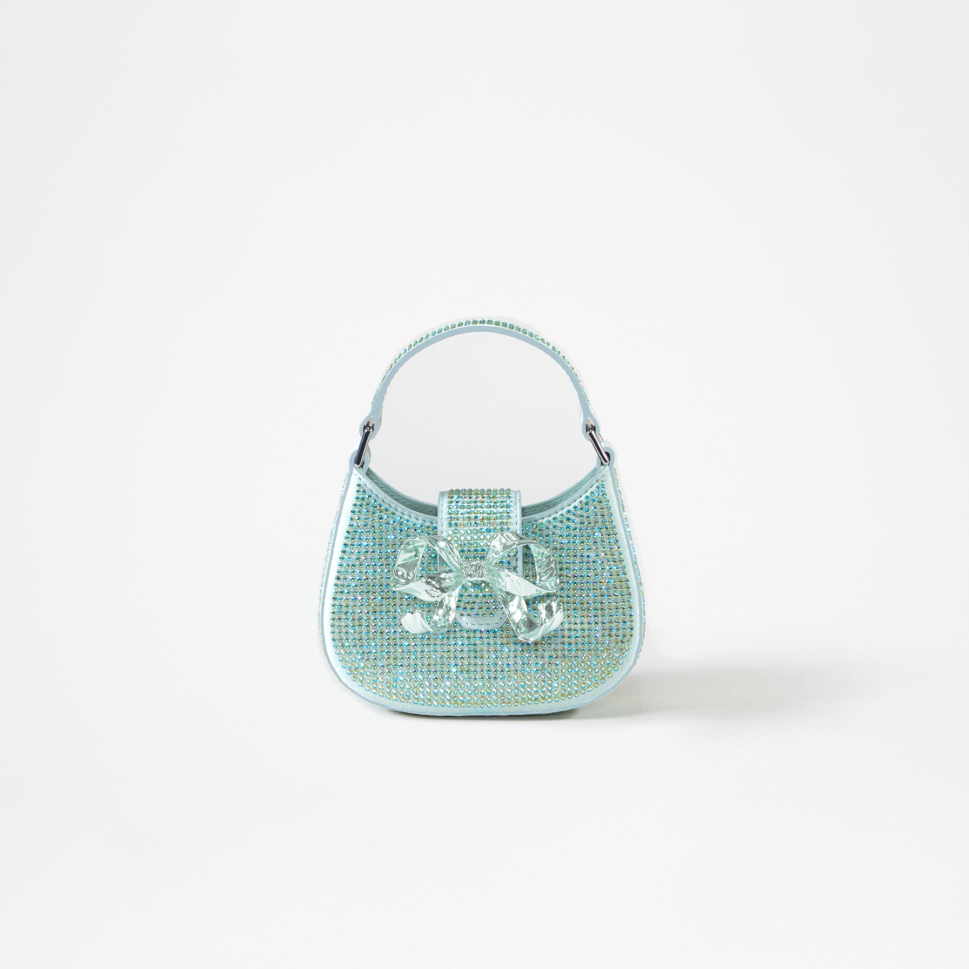 A woman wearing the Green Rhinestone Crescent Bow Micro Bag