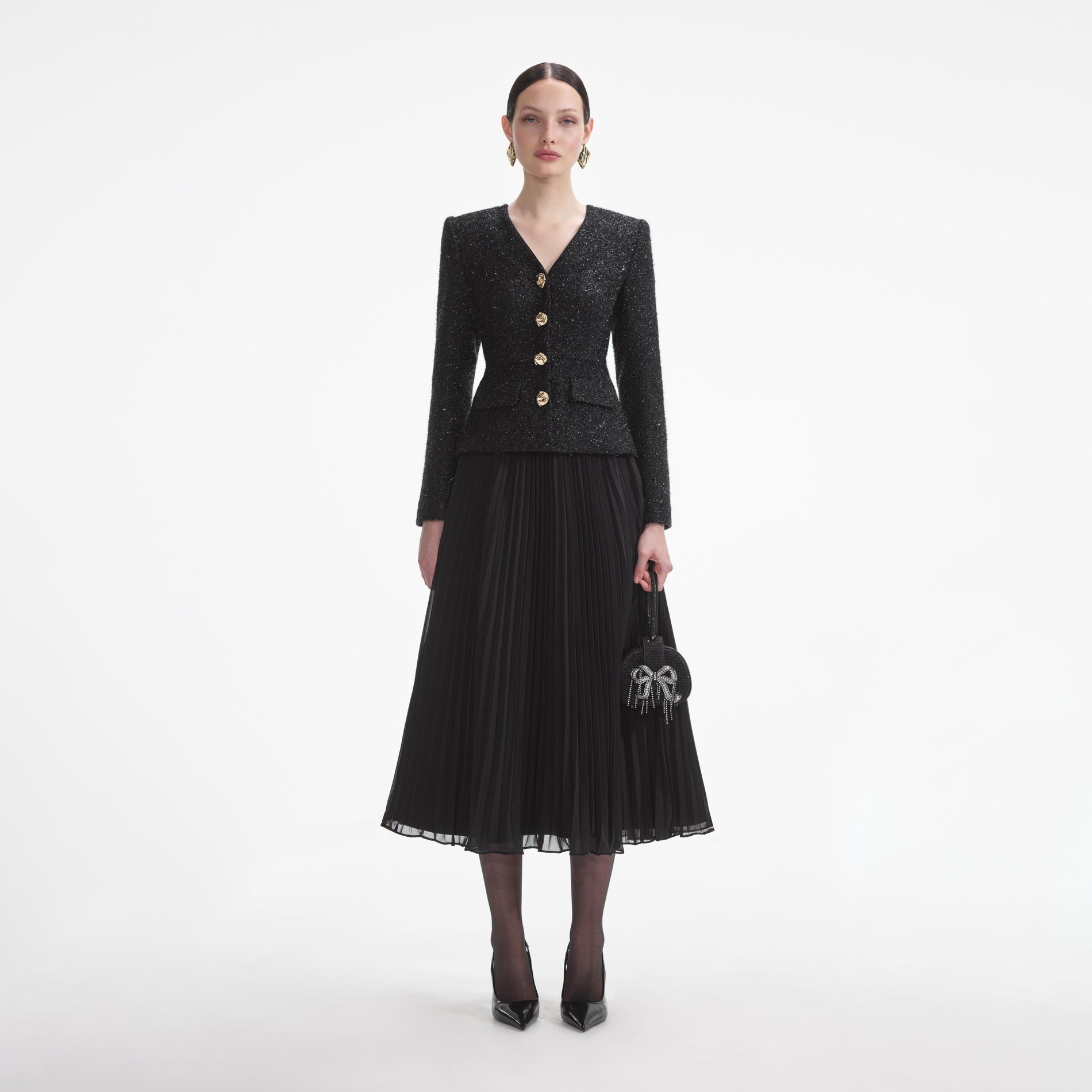 Front view of a woman wearing the Black Tinsel Boucle Chiffon Midi Dress