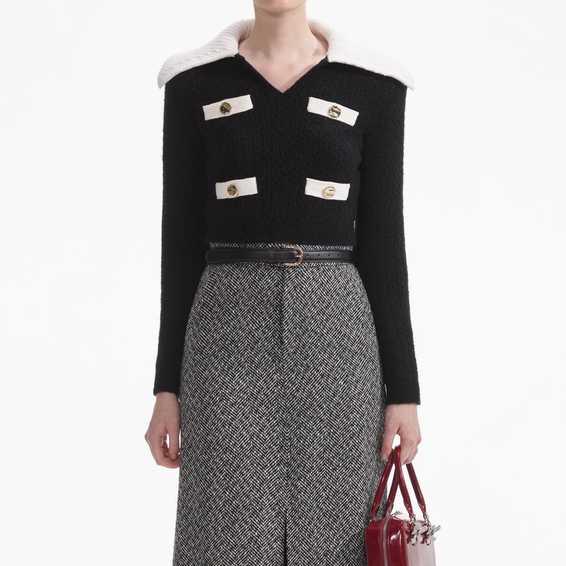 A close up of a woman wearing the Black Cashmere Blend Jumper