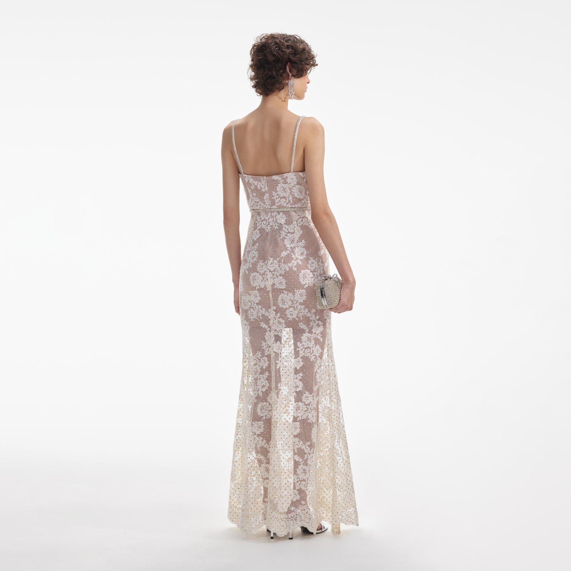 Back view of a woman wearing the White Cream Rhinestone Lace Maxi Dress