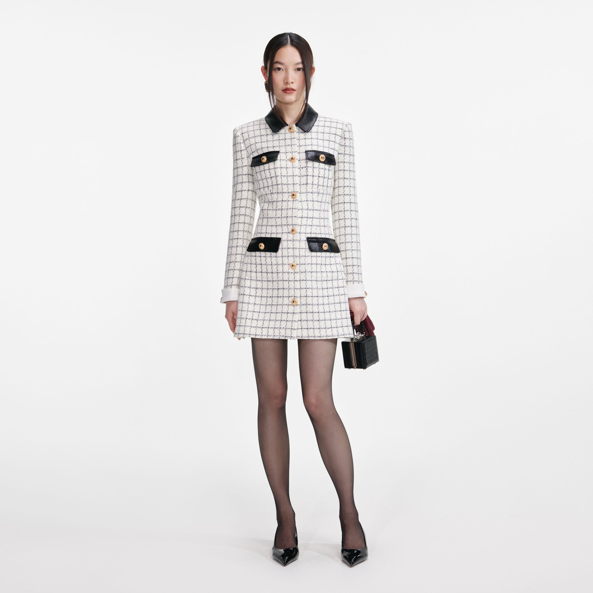 Front view of a woman wearing the Check Boucle Long Sleeve Mini Dress