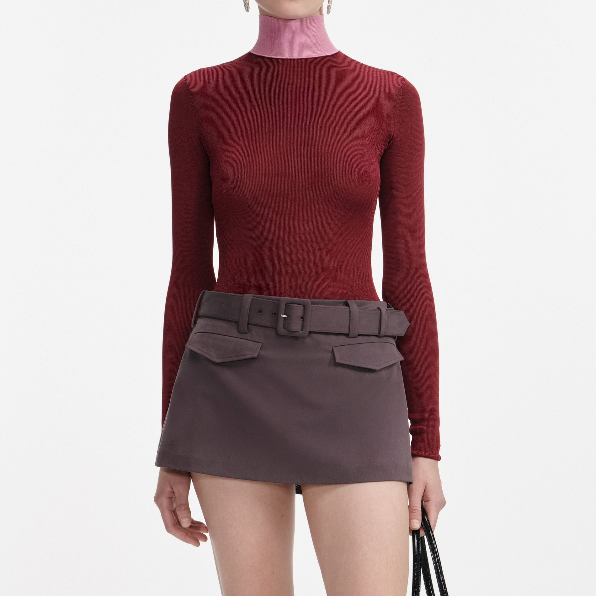 A close up of a woman wearing the Burgundy Contrast Viscose Knit Top