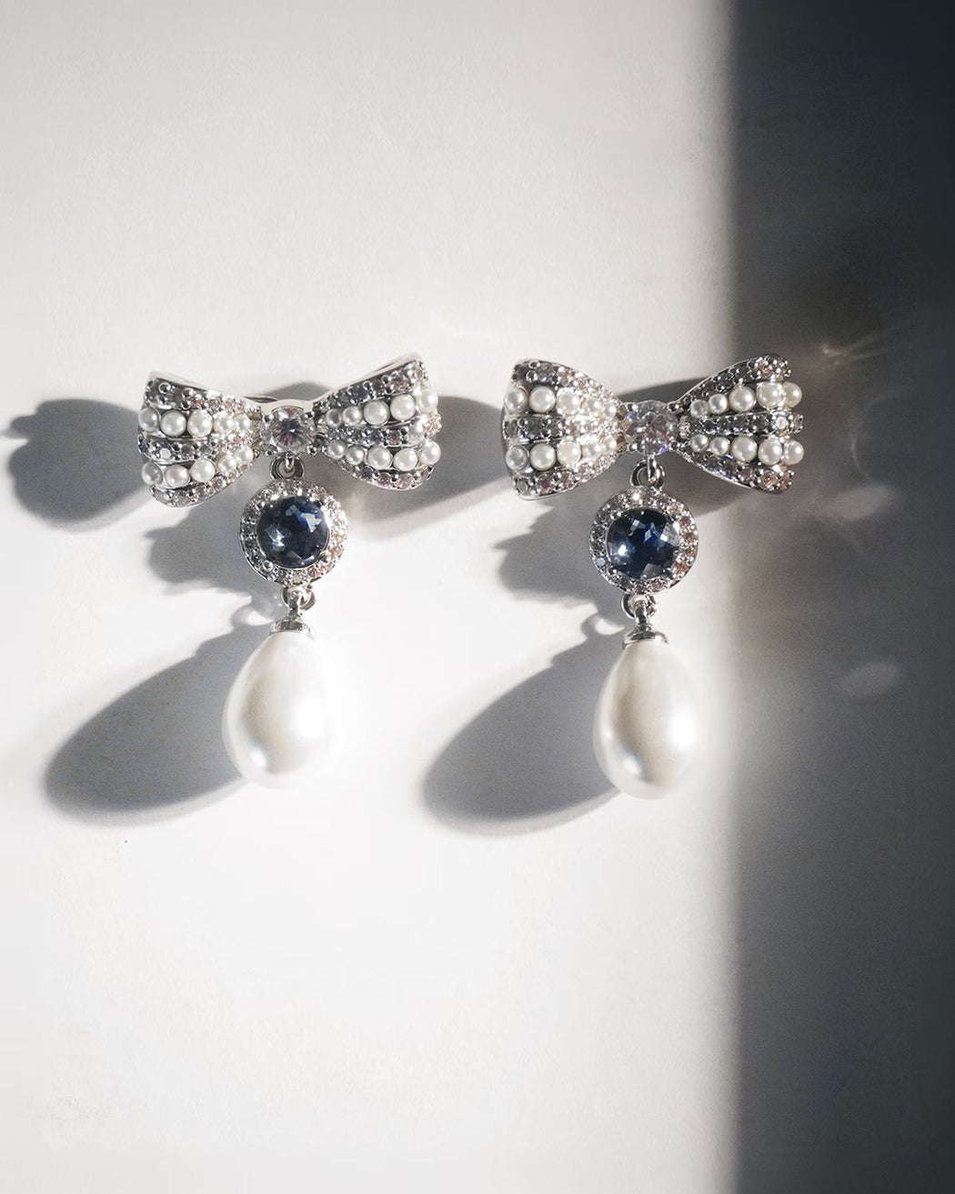 Silver Crystal Bow Blue Pearl Droplet Earrings