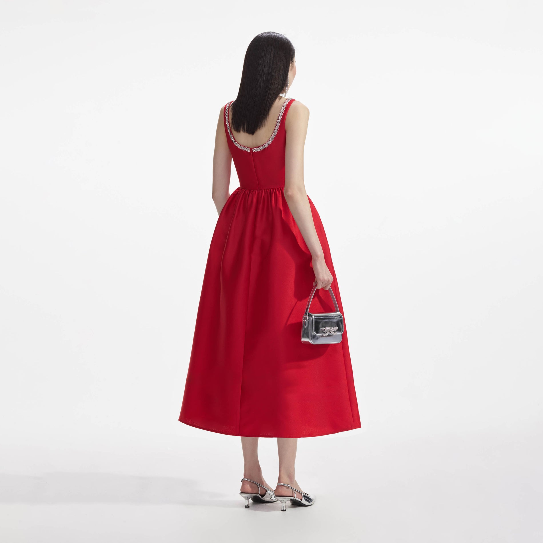 Back view of a woman wearing the Red Taffeta Diamante Midi Dress