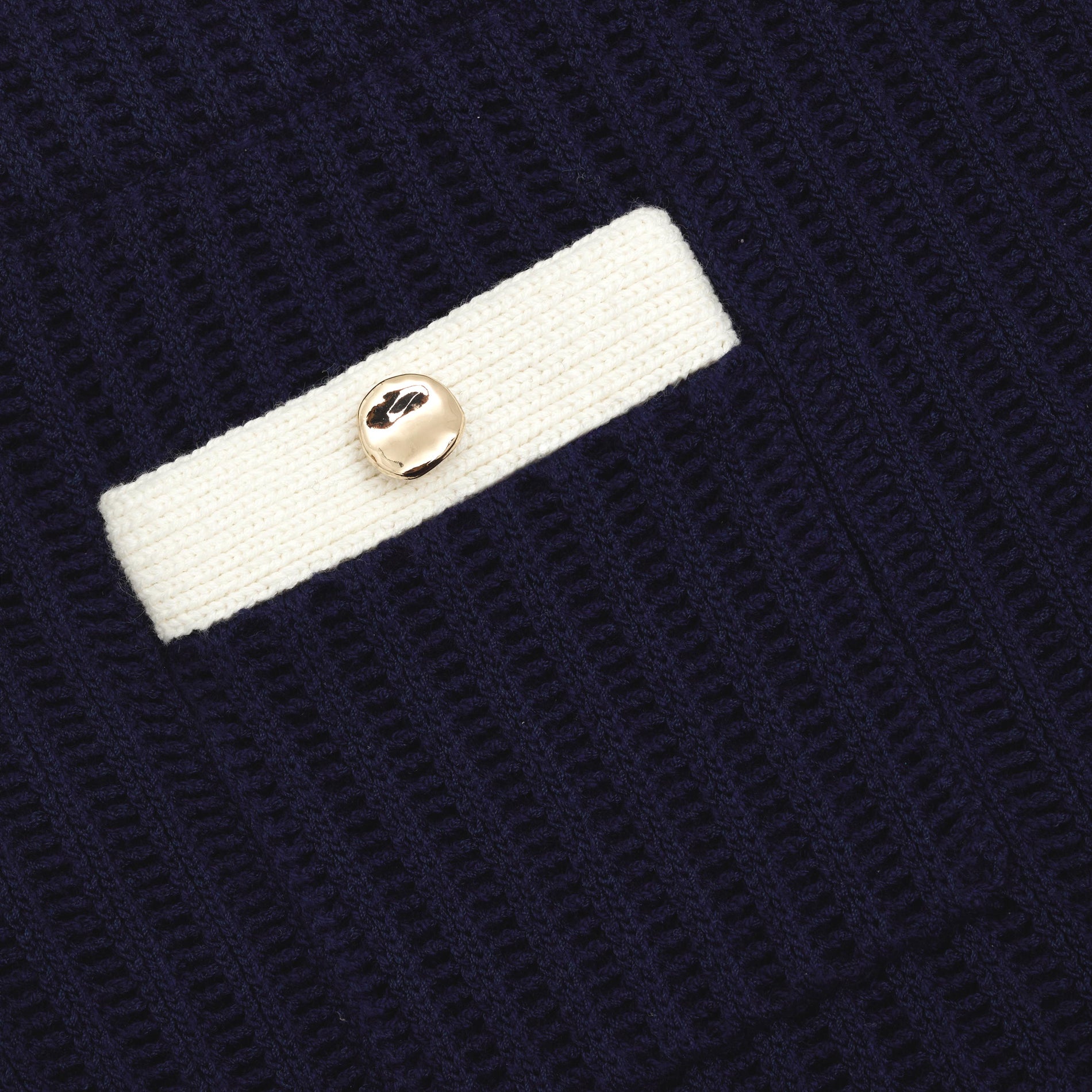 A close up of the fabric for the Navy Crochet Contrast Trim Mini Skirt