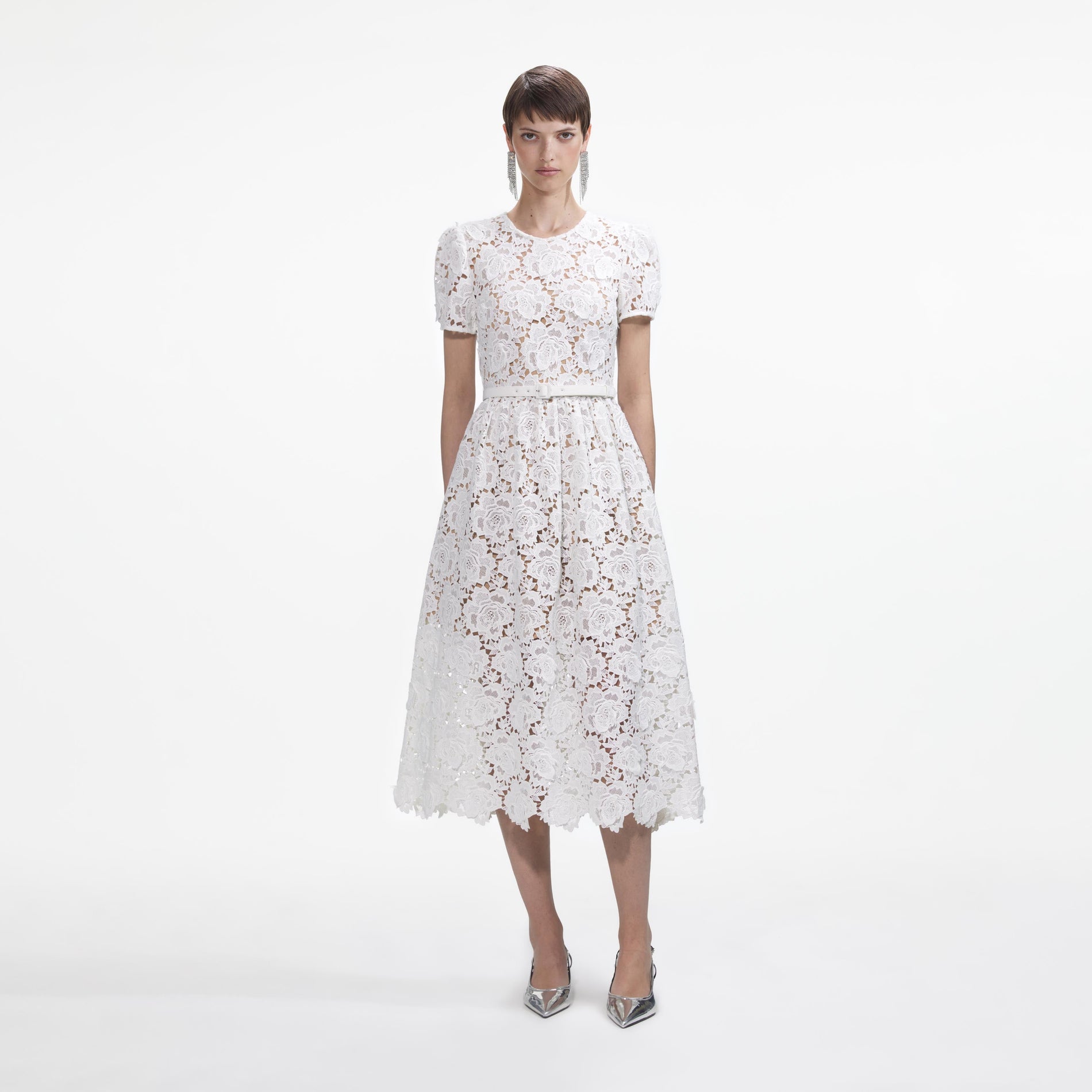 Front view of a woman wearing the White Floral Lace Midi Dress