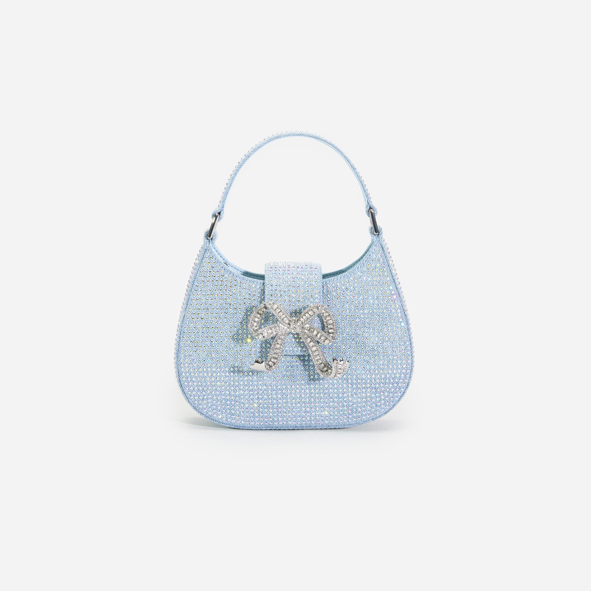 Front view of a woman wearing the Blue Rhinestone Denim Cresent Bag