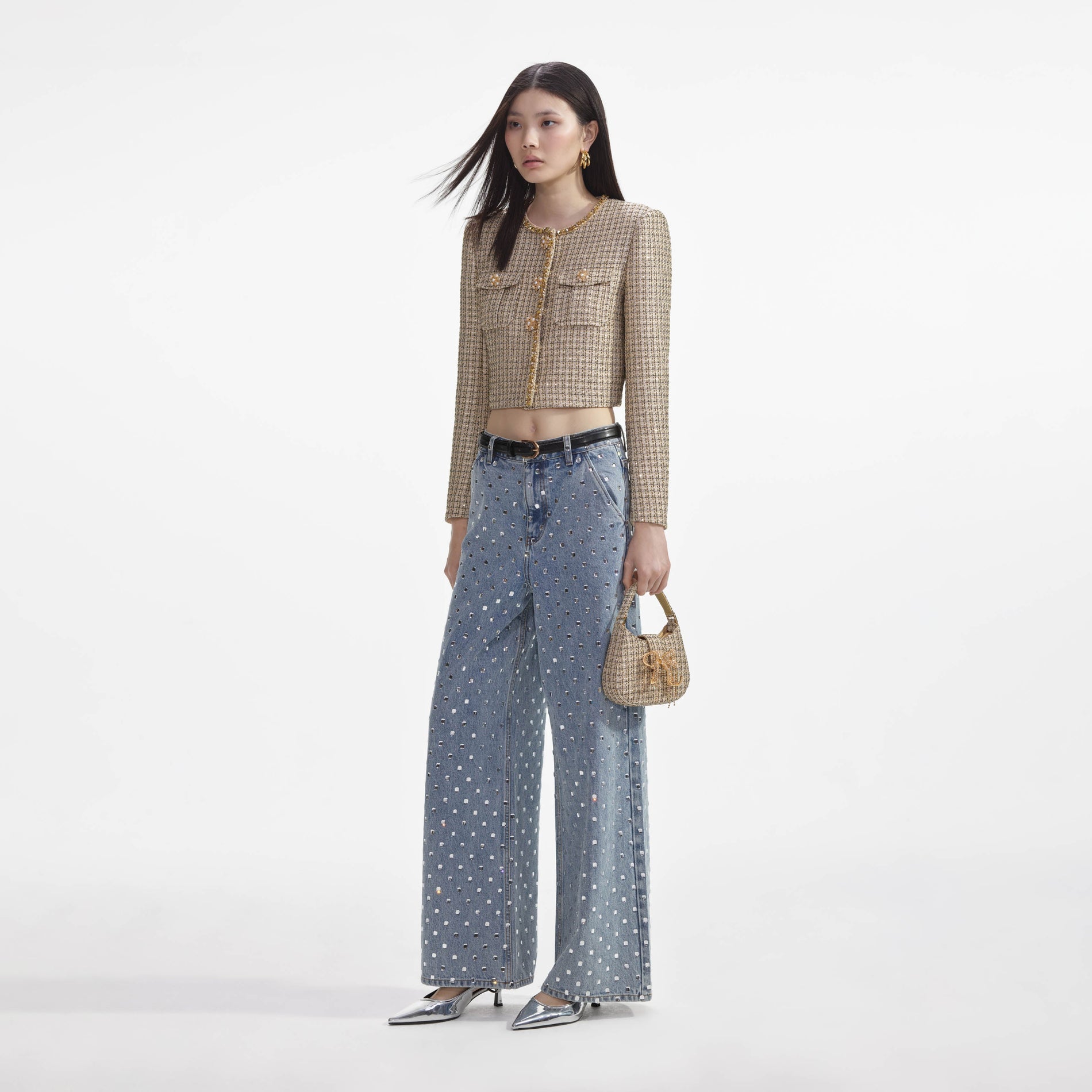 Side view of a woman wearing the Gold Boucle Cropped Jacket