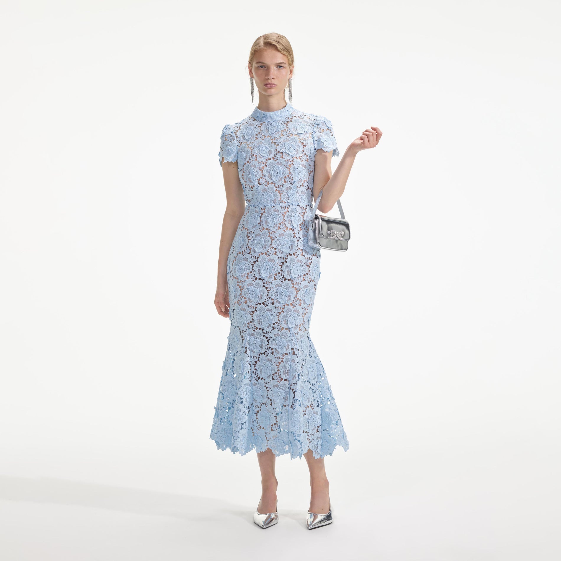 Front view of a woman wearing the Blue Flower Lace Midi Dress