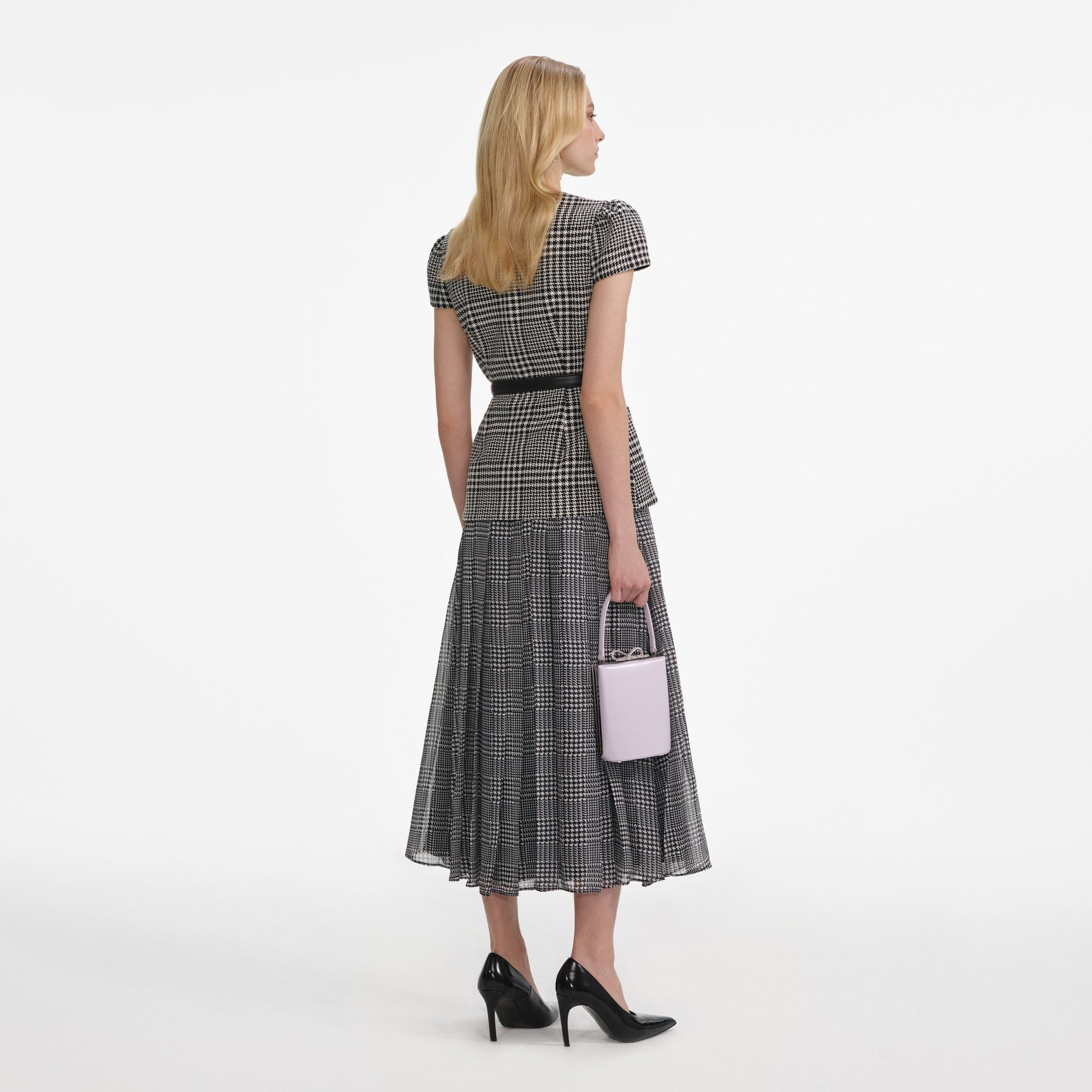 Back view of a woman wearing the Houndstooth Tailored Midi Dress