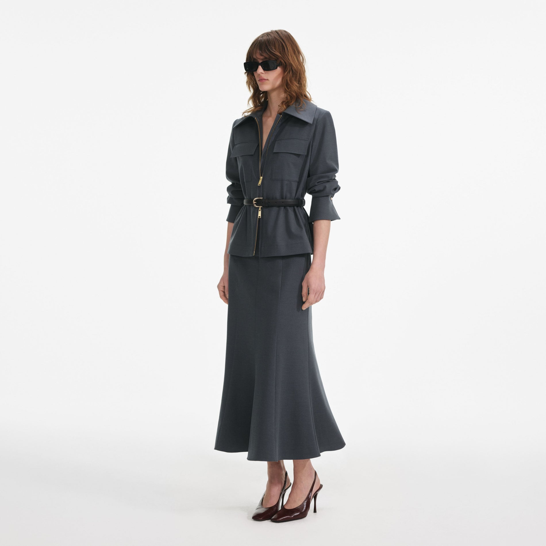 Side view of a woman wearing the Grey Twill Midi Dress