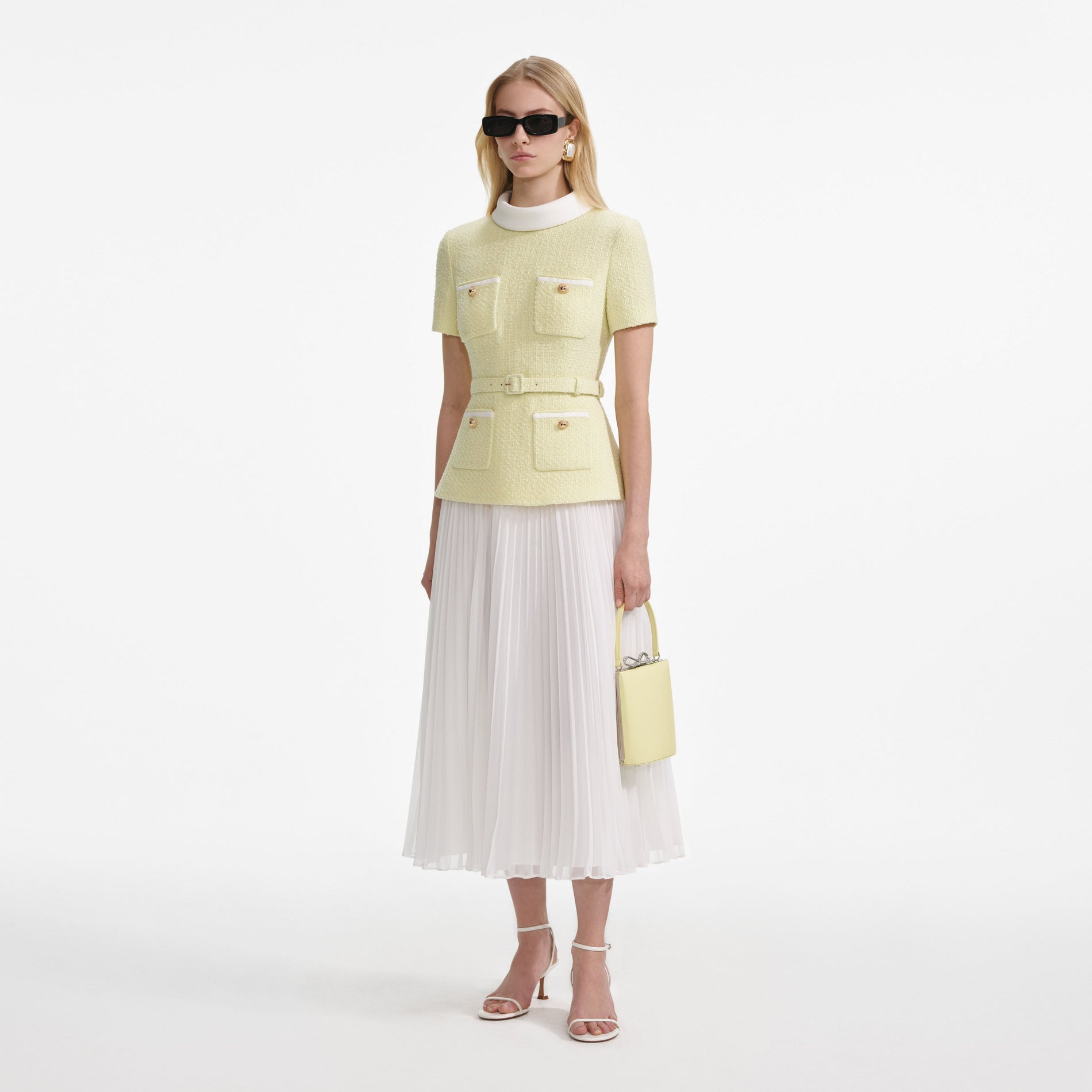 Side view of a woman wearing the Yellow Boucle Midi Dress