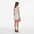 White Pointelle Peplum Knit Mini Dress