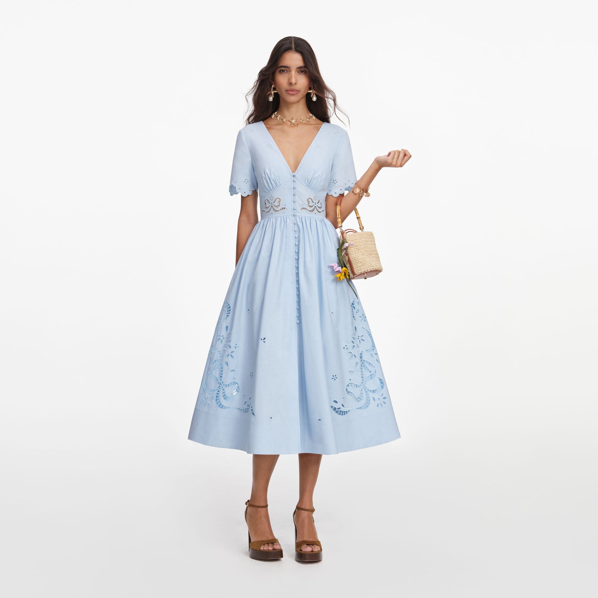 Front view of a woman wearing the Blue Cotton Embroidered Midi Dress