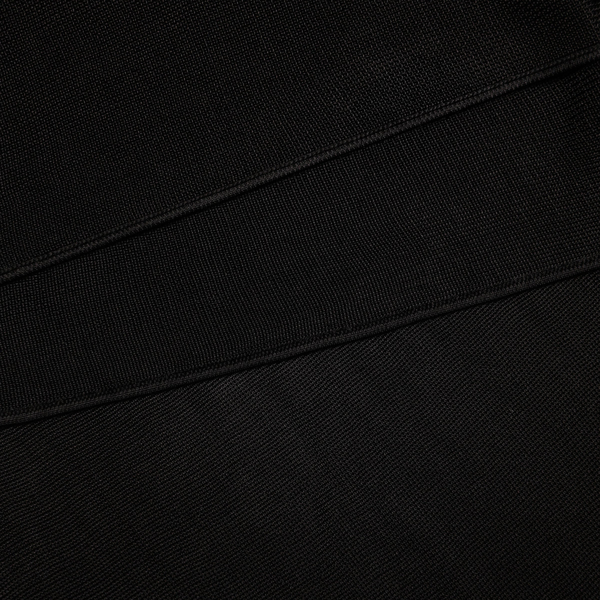 A close up of the fabric for the Black Viscose Knit One Shoulder Maxi Dress