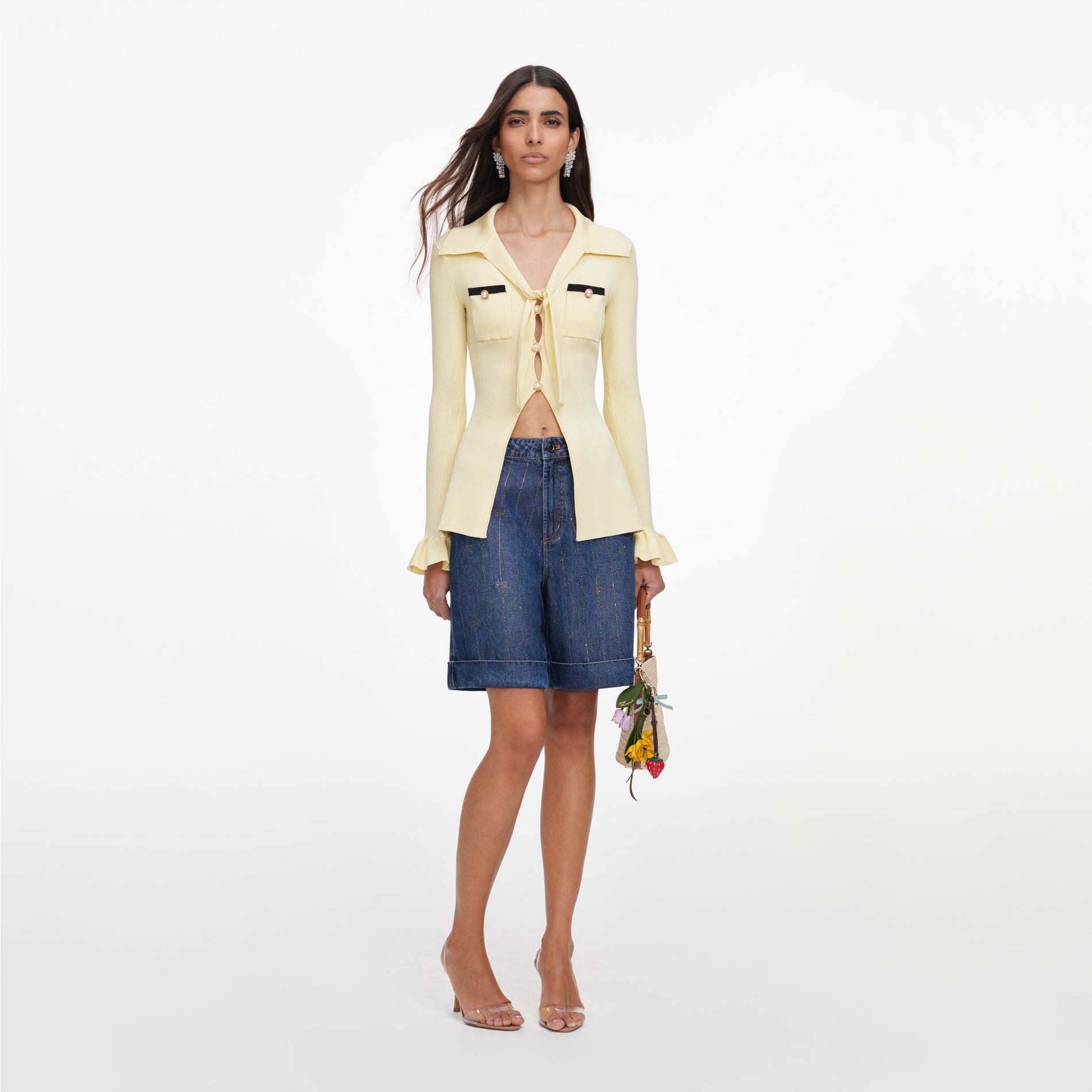 Front view of a woman wearing the Yellow Viscose Knit Tie Top