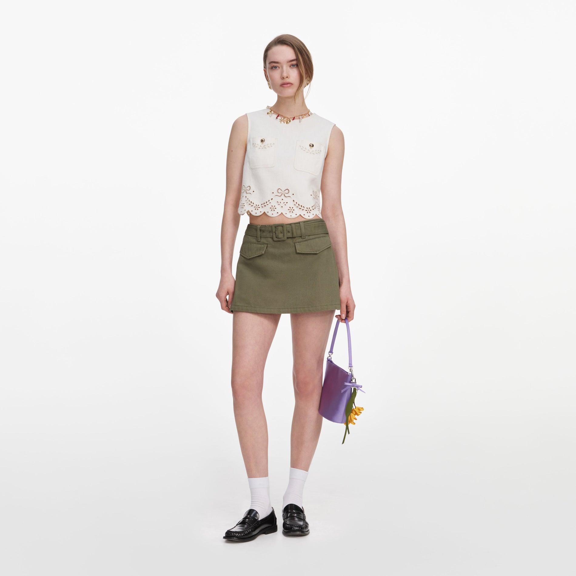 Front view of a woman wearing the Cream Broderie Denim Top