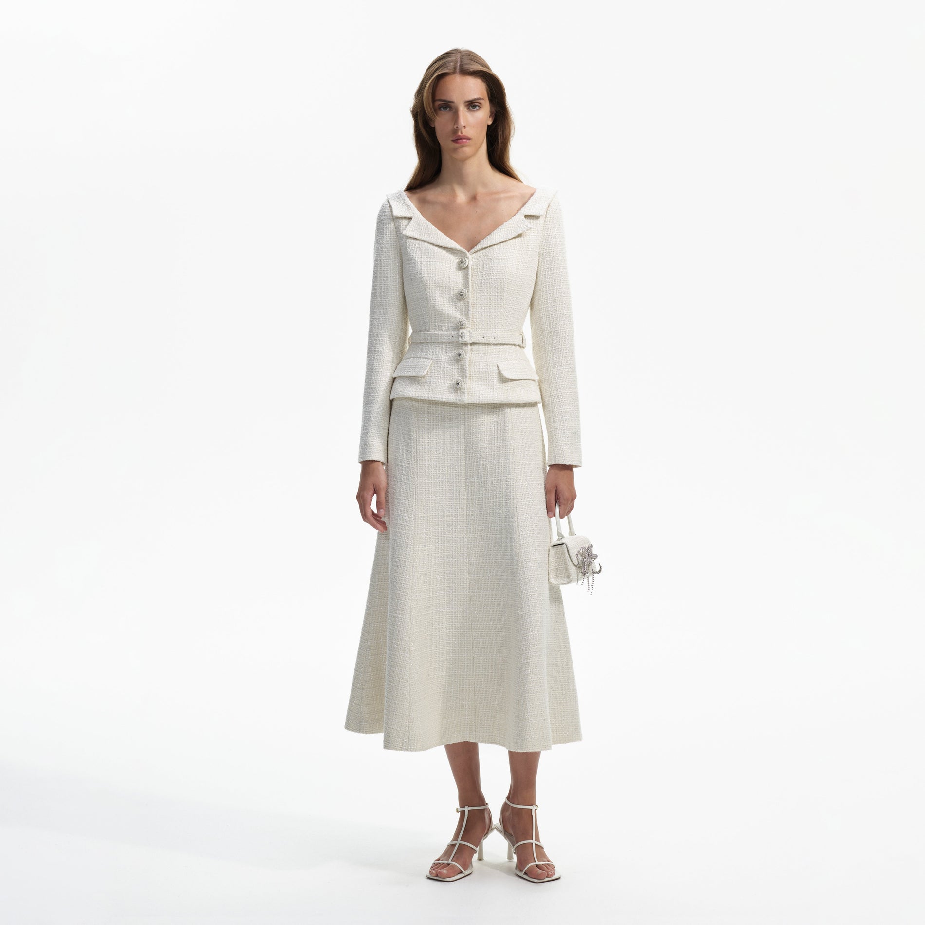 Front view of a woman wearing the Cream Boucle Tailored Off Shoulder Midi Dress