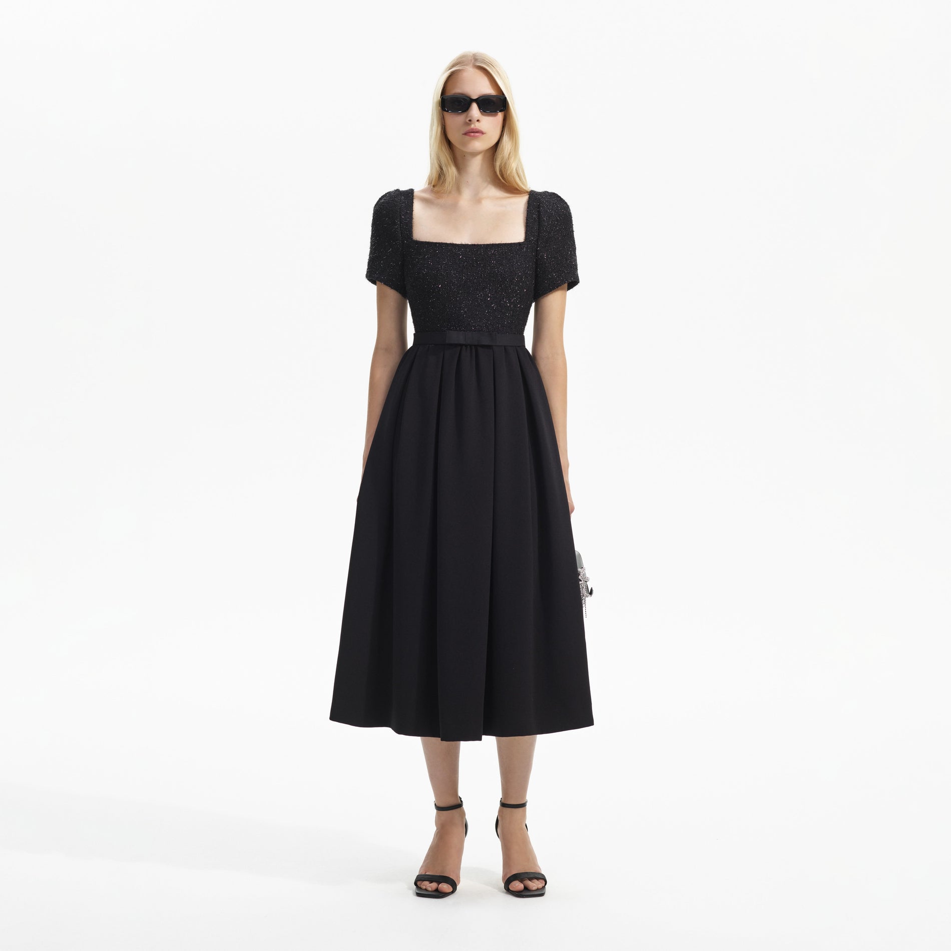 Front view of a woman wearing the Black Boucle Square Neck Midi Dress