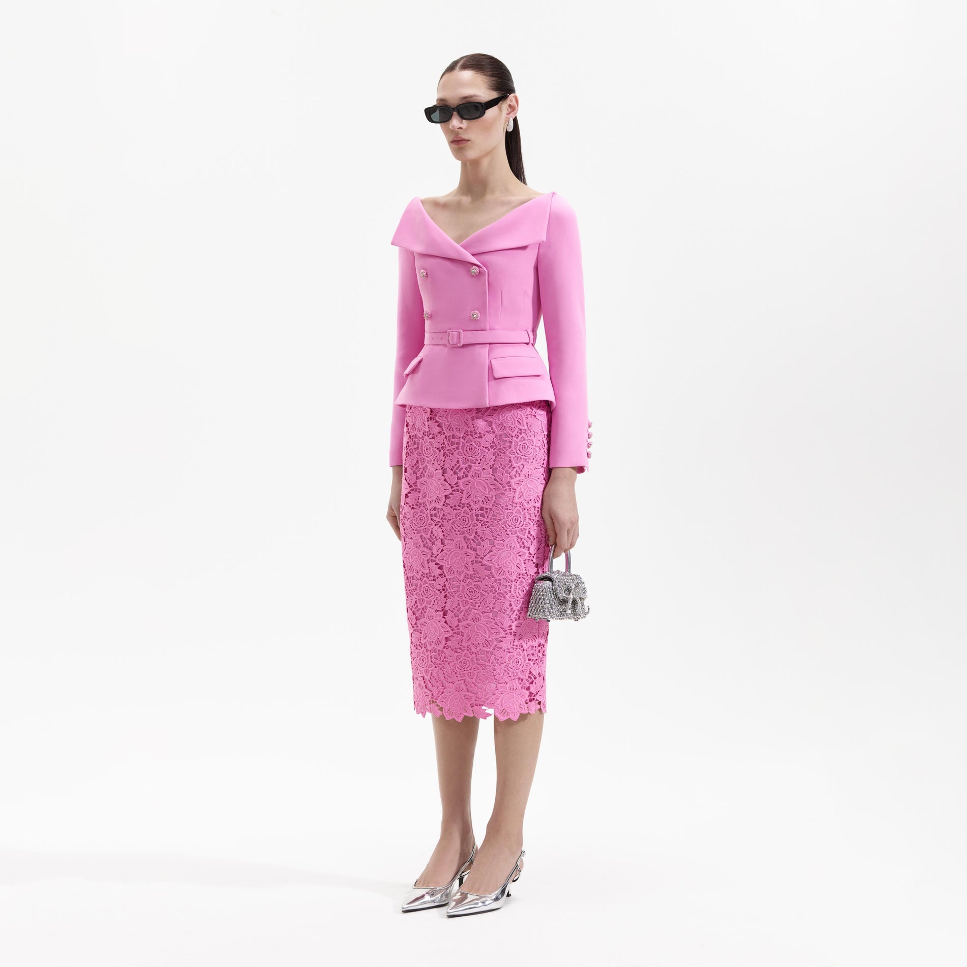 Side view of a woman wearing the Pink Crepe Tailored Midi Dress