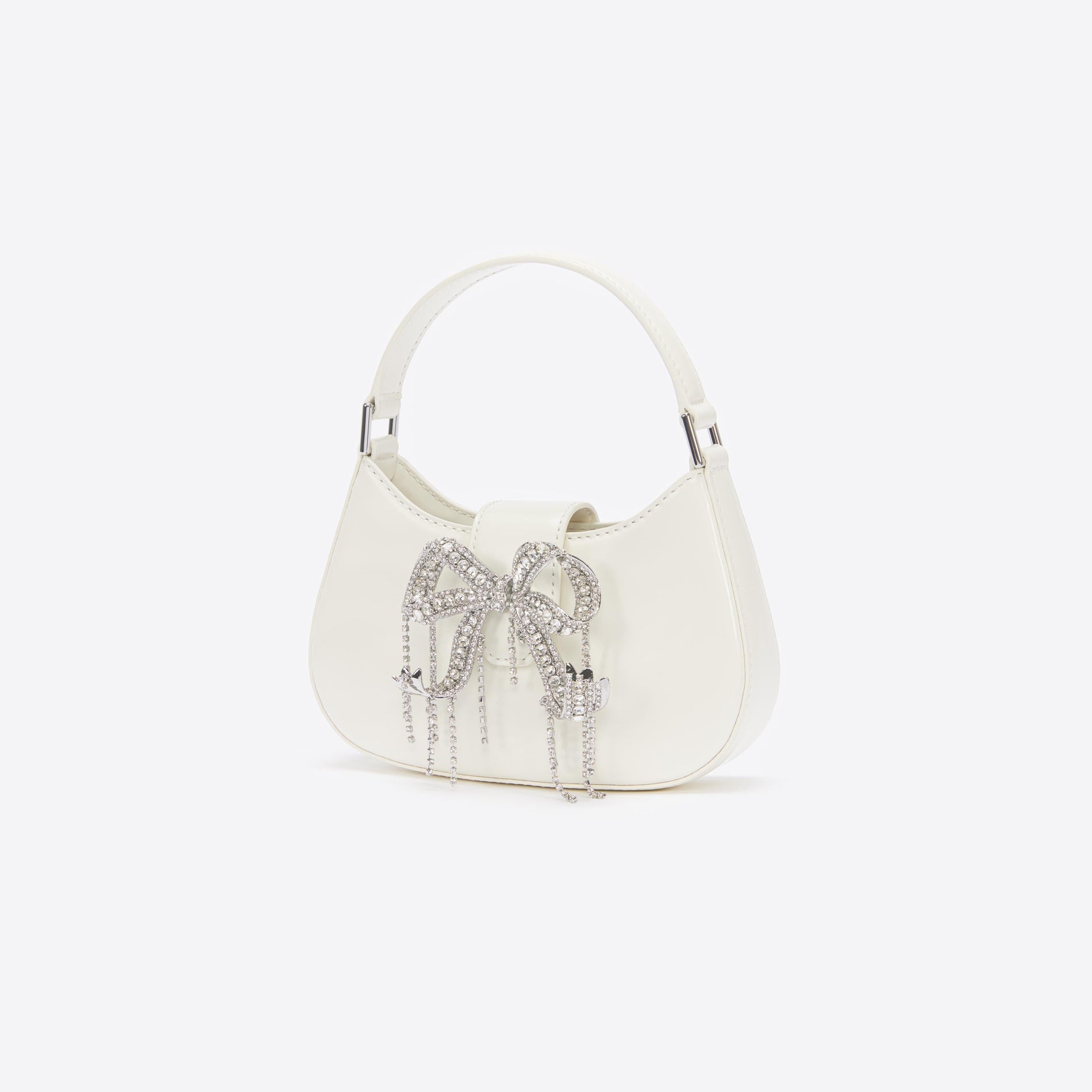 Back view of a woman wearing the Cream Leather Crescent Bag