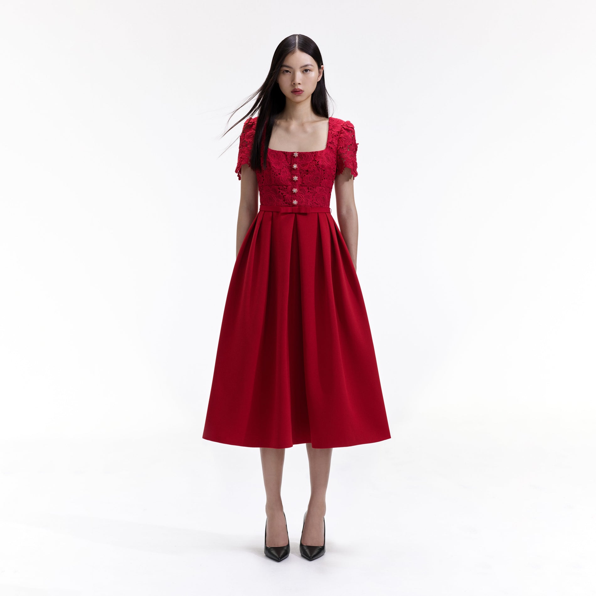 Front view of a woman wearing the Red Lace Crepe Midi Dress