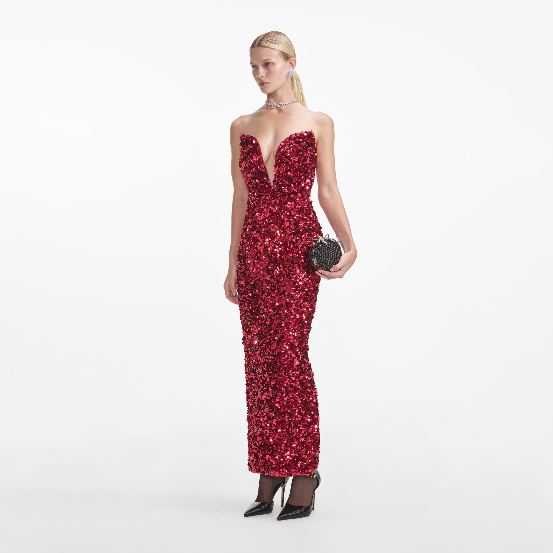 Side view of a woman wearing the Red 3D Sequin Midi Dress