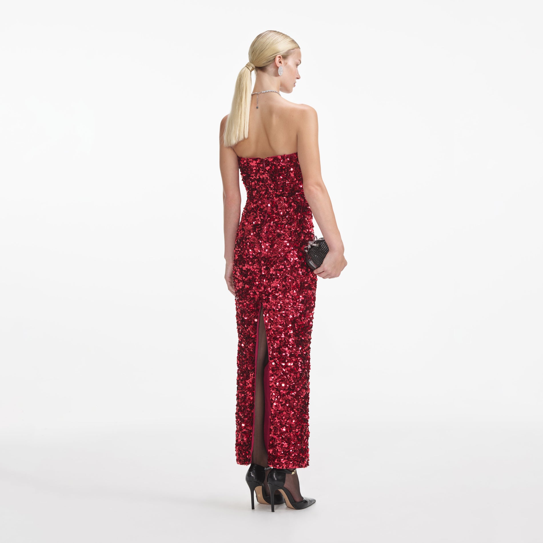 Back view of a woman wearing the Red 3D Sequin Midi Dress