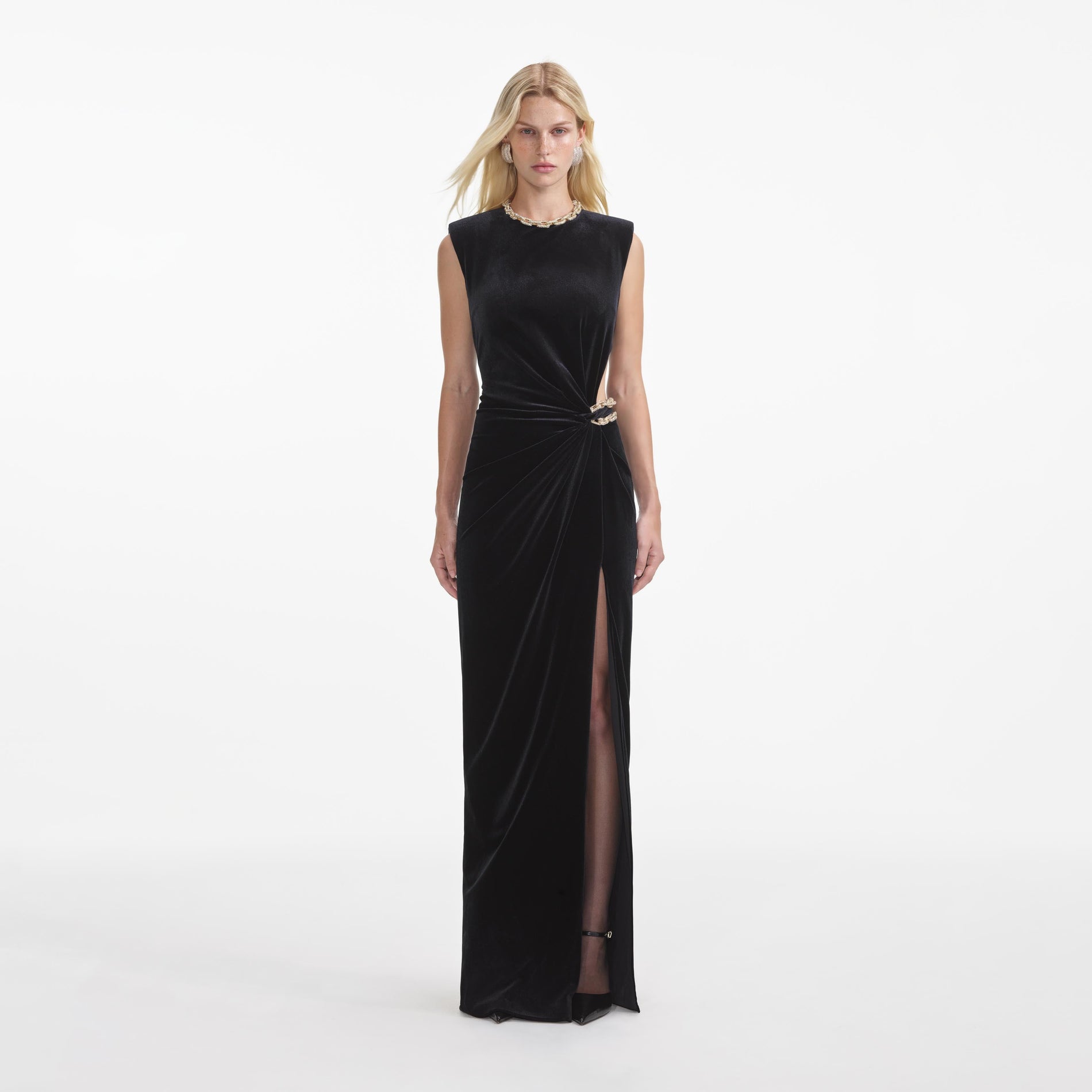 Front view of a woman wearing the Black Velvet Embellished Maxi Dress