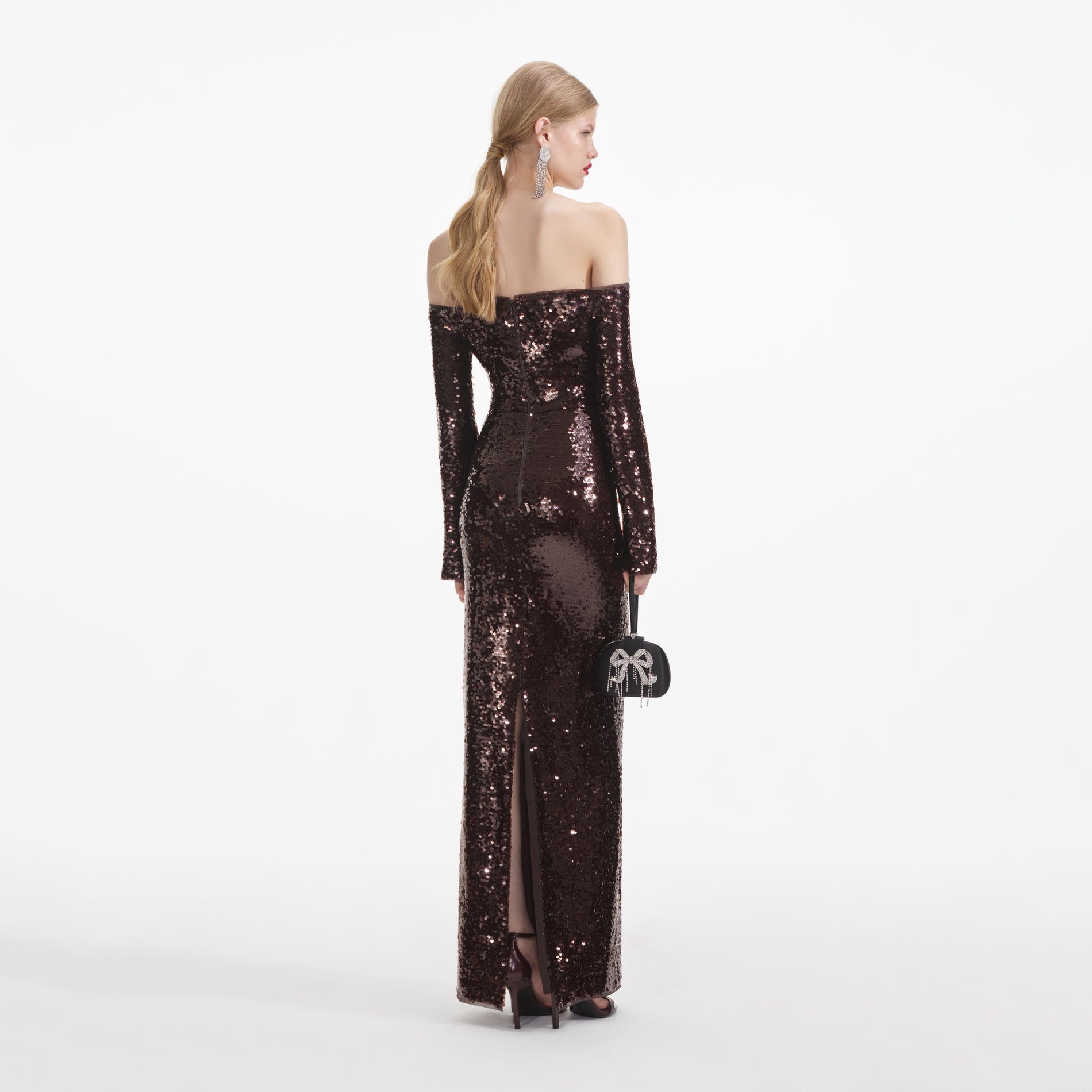 Back view of a woman wearing the Brown Sequin Off Shoulder Maxi Dress