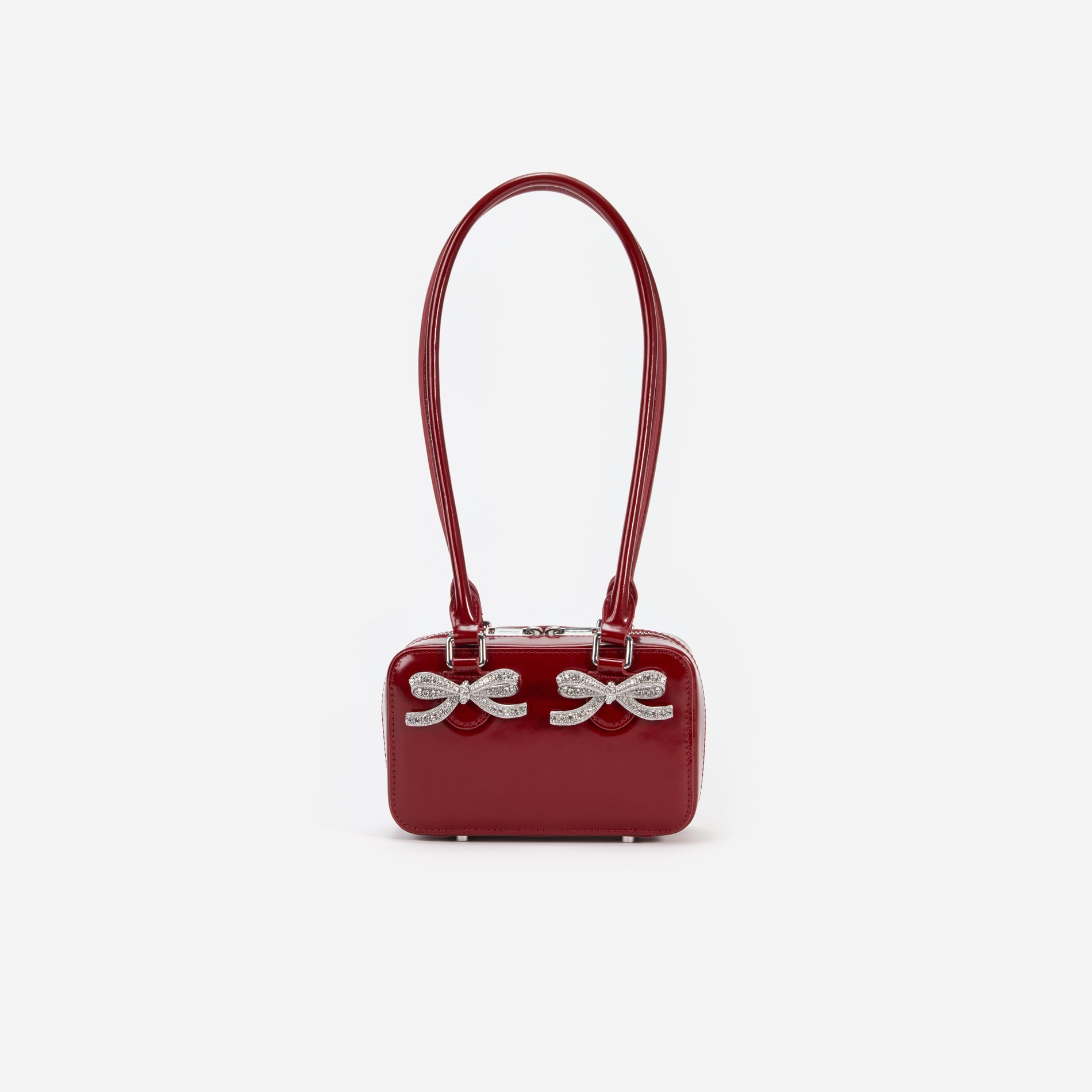 Front view of a woman wearing the Burgundy Leather Shoulder Bag