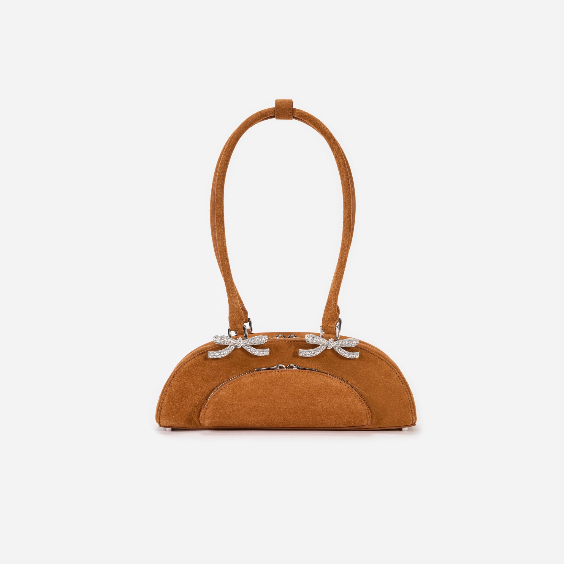 Front view of a woman wearing the Brown Suede Curved Shoulder Bag