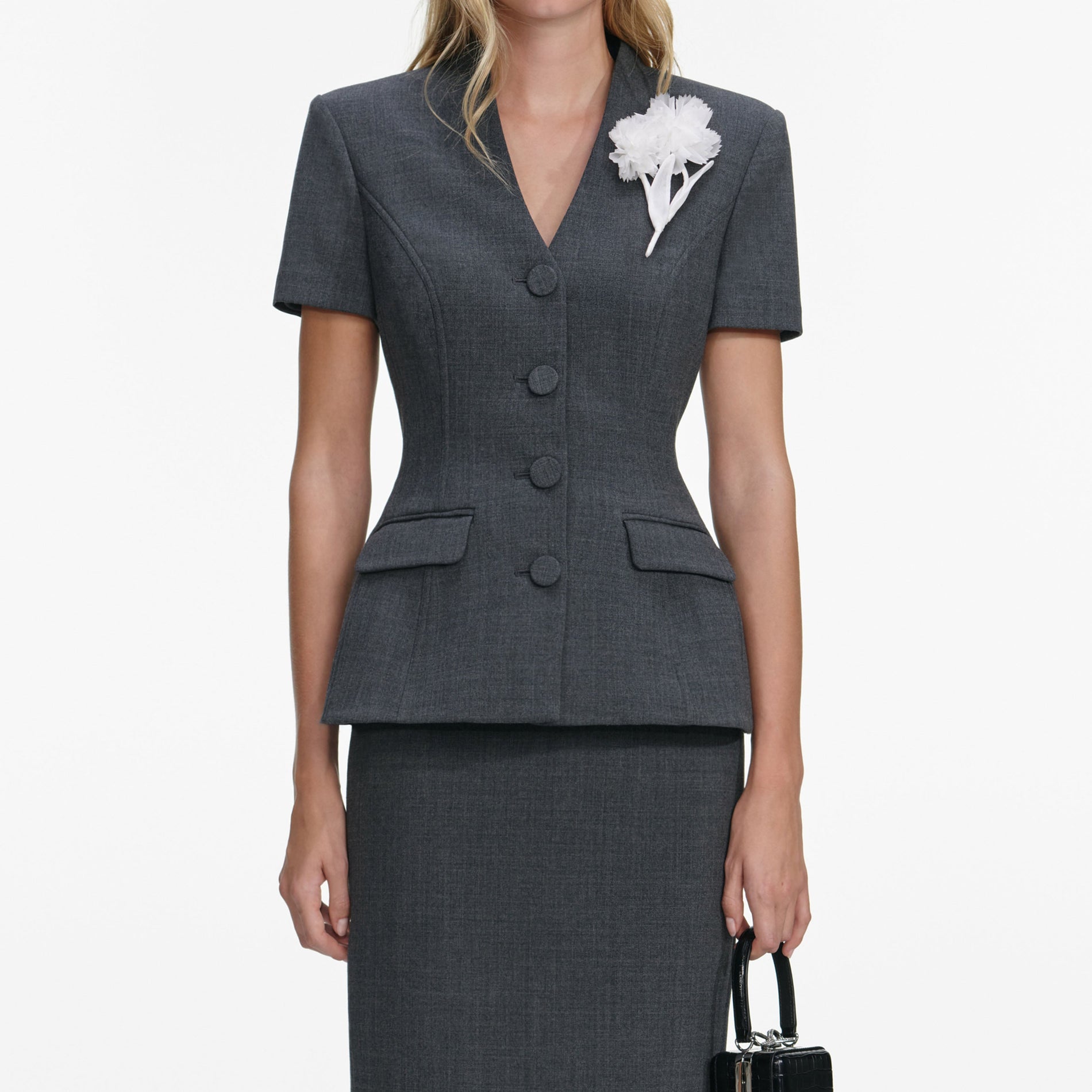 A close up of a woman wearing the Grey Tailored Flower Detail Midi Dress