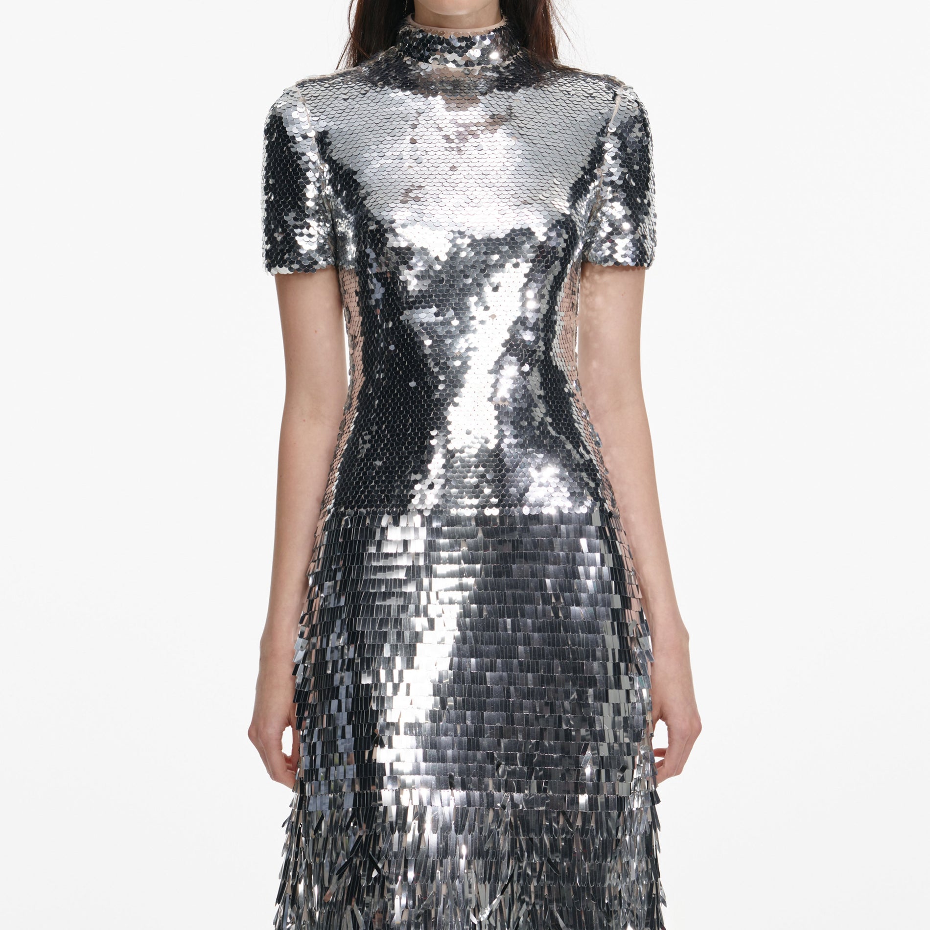 A close up of a woman wearing the Silver Gradient Sequin Midi Dress