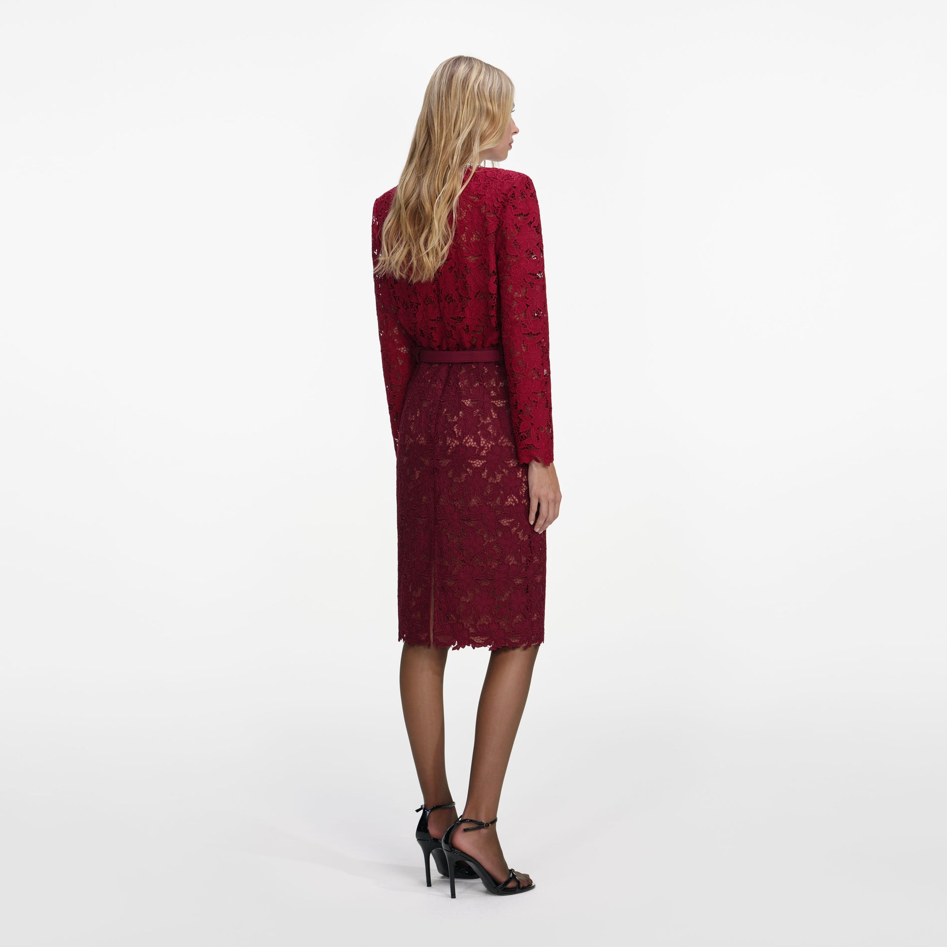 Back view of a woman wearing the Burgundy Lace Crystal Top
