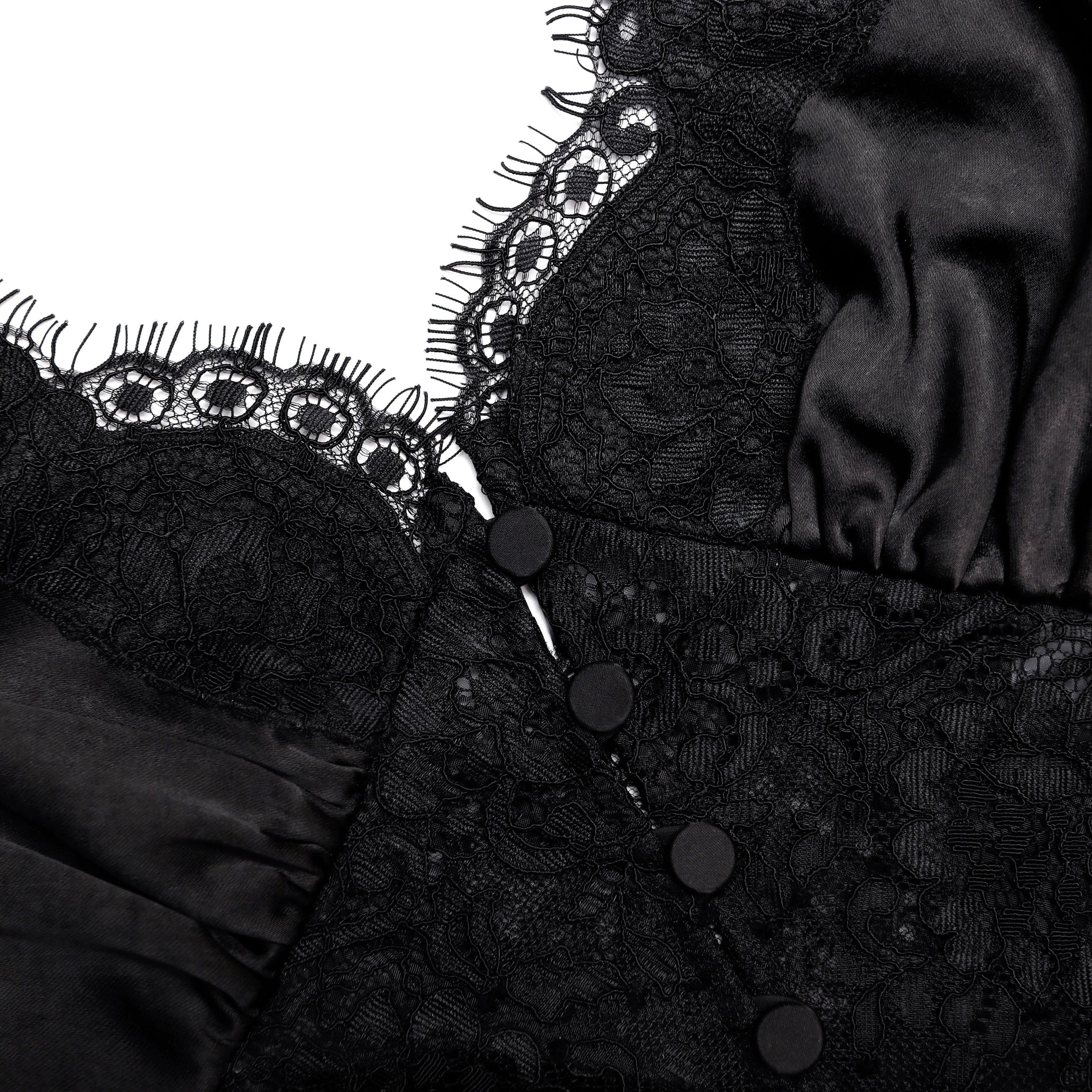A close up of the fabric for the Black Satin Lace Top