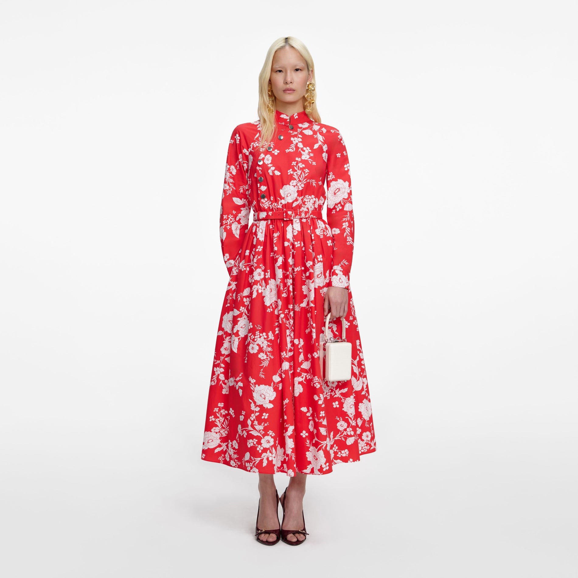 Front view of a woman wearing the Red Floral Cotton Midi Dress