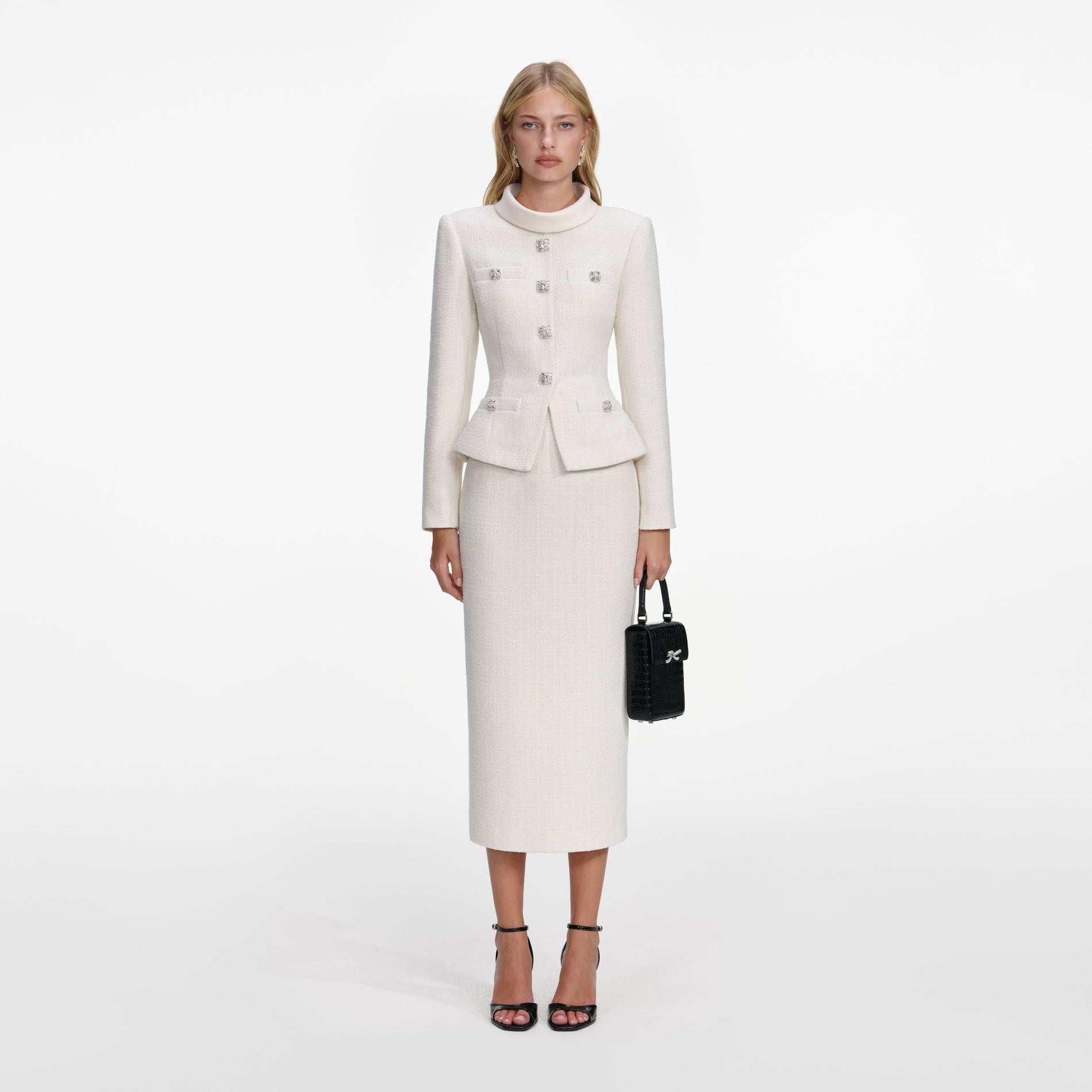 Front view of a woman wearing the Cream Boucle Tailored Midi Dress