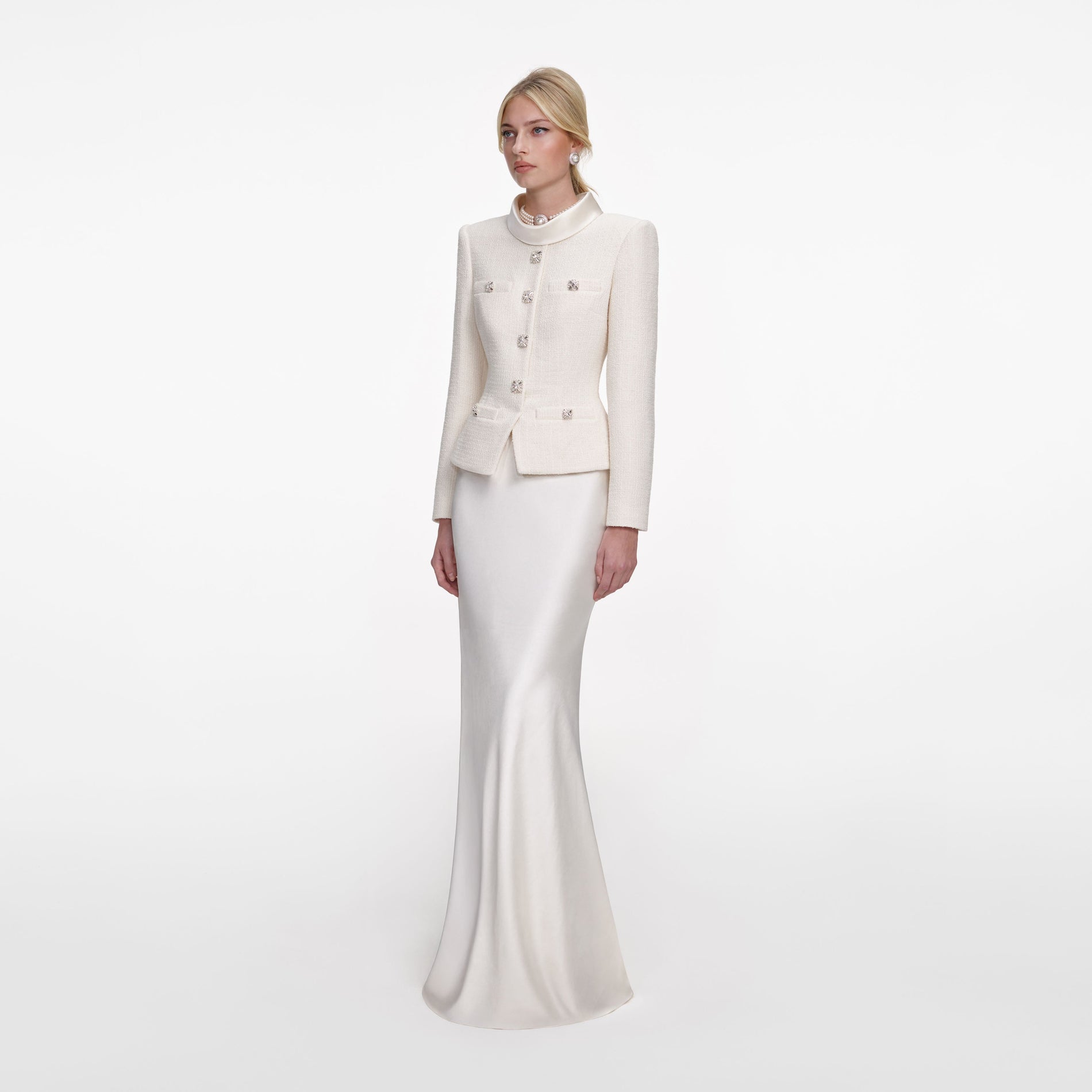 Side view of a woman wearing the Cream Boucle Collared Maxi Dress