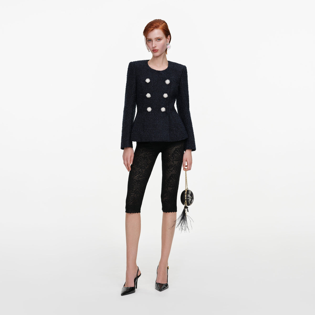 Front view of a woman wearing the Navy Boucle Jacket