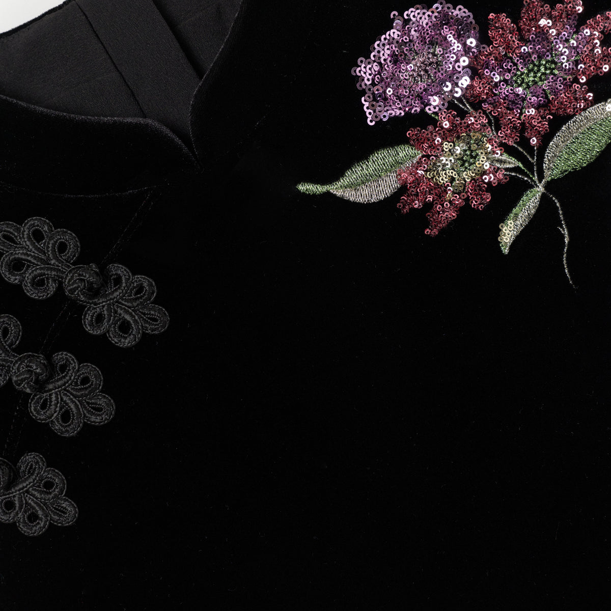 Detail Shot of the Black Velvet Flower Embellished Dress